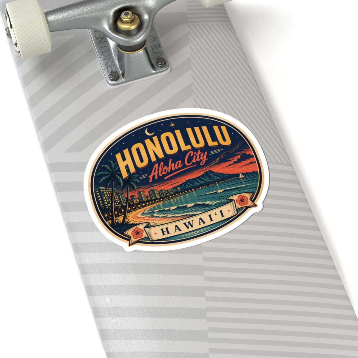 Honolulu luggage tag sticker on gray striped luggage, oval beach sunset with 'Hawai‘i'