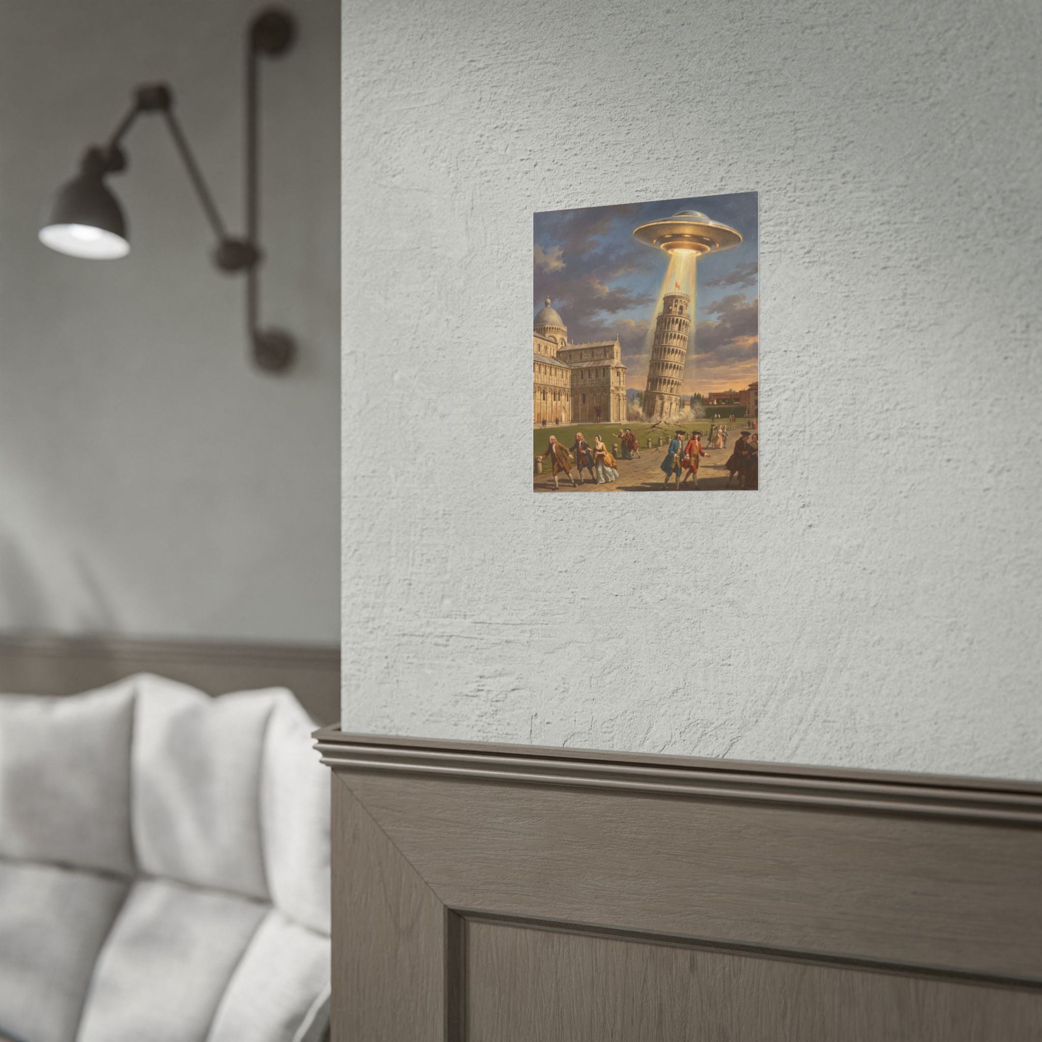 Small wall-mounted poster showing glowing UFO above Leaning Tower and city crowd
