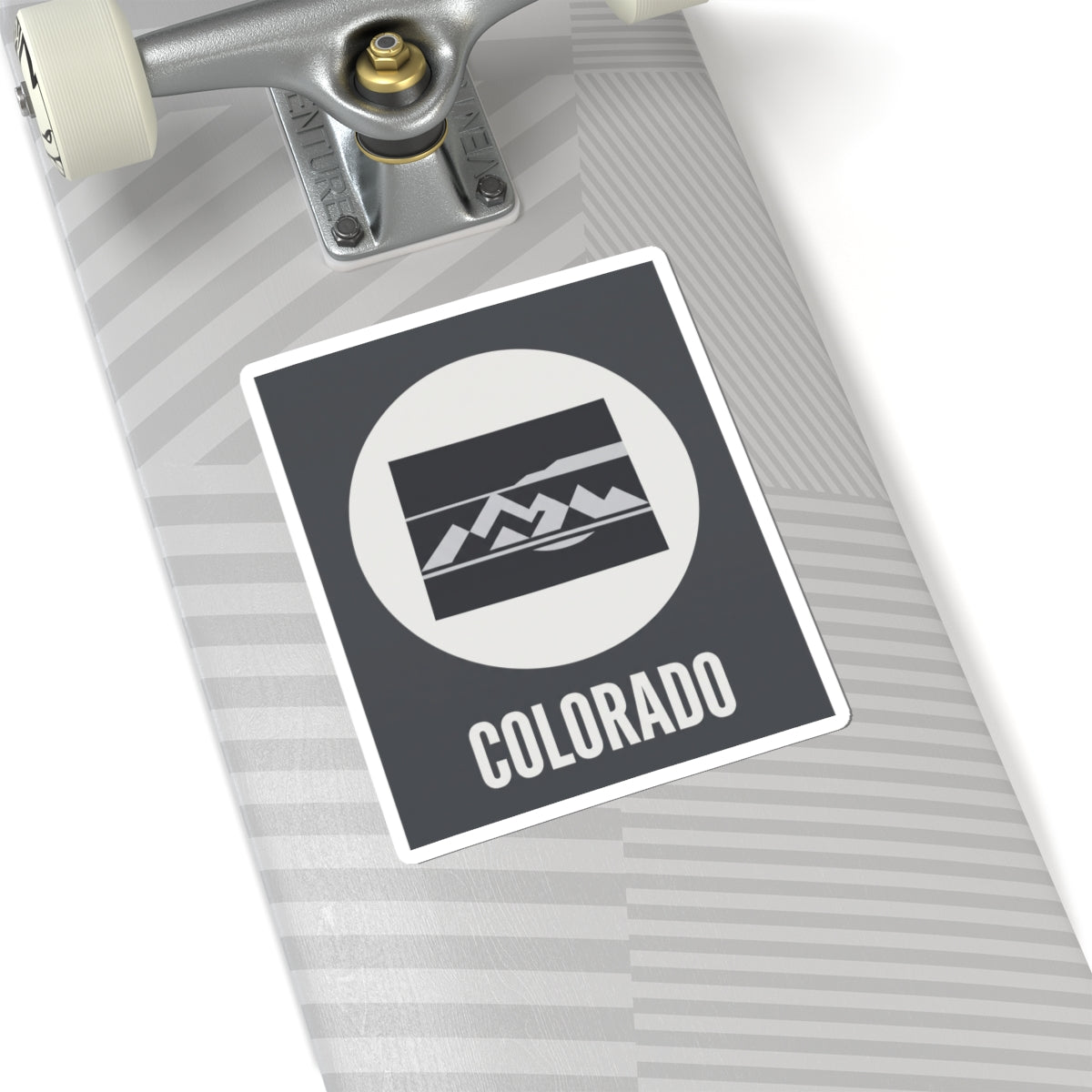 Colorado badge sticker with white circular emblem, mountain stripe design, and COLORADO lettering