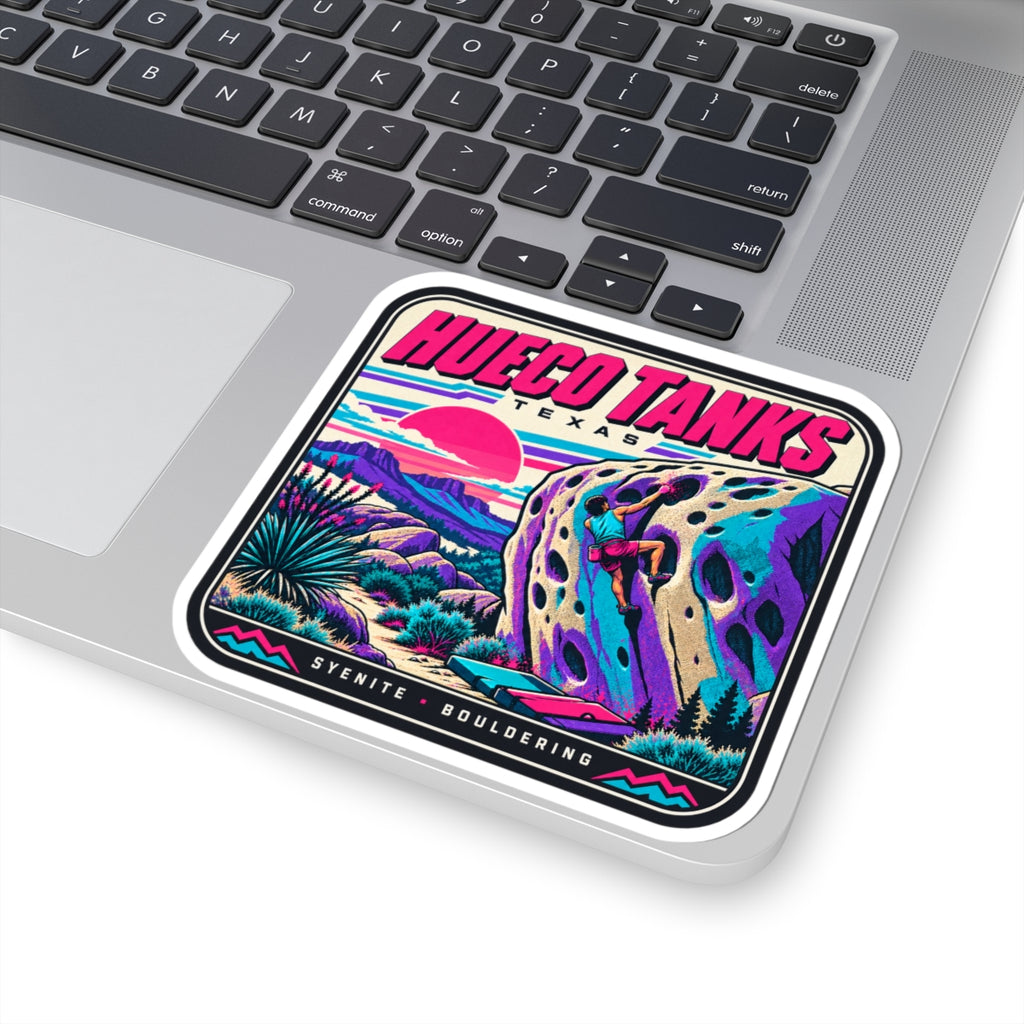Square bouldering sticker with Hueco Tanks Texas lettering and desert plants on a bright mural background