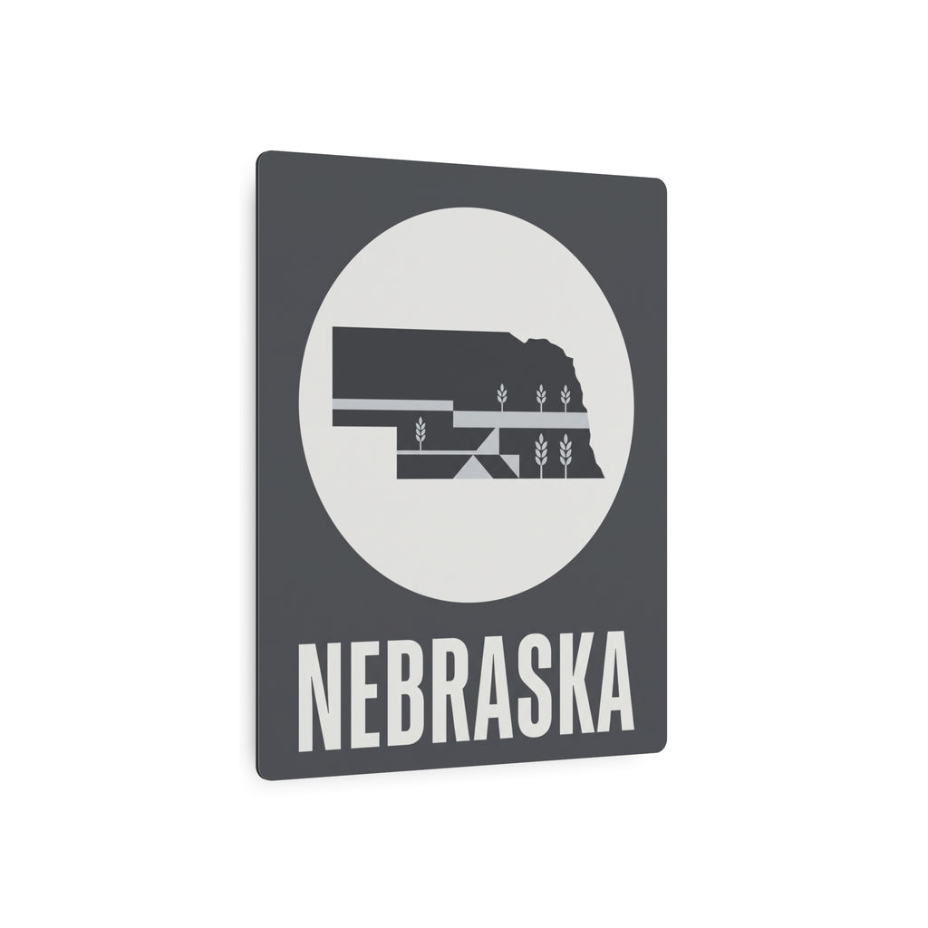 Nebraska metal art sign with dark square frame, circular wheat scene, and NEBRASKA lettering