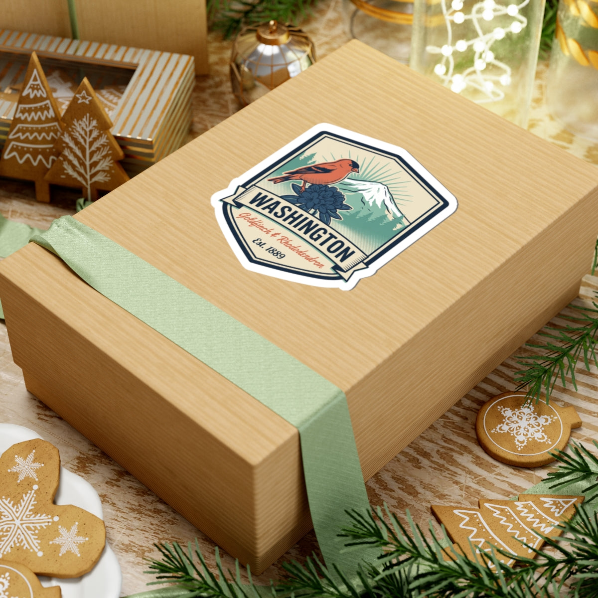 Washington badge sticker on gift box with orange bird, blue flower, and Est. 1889