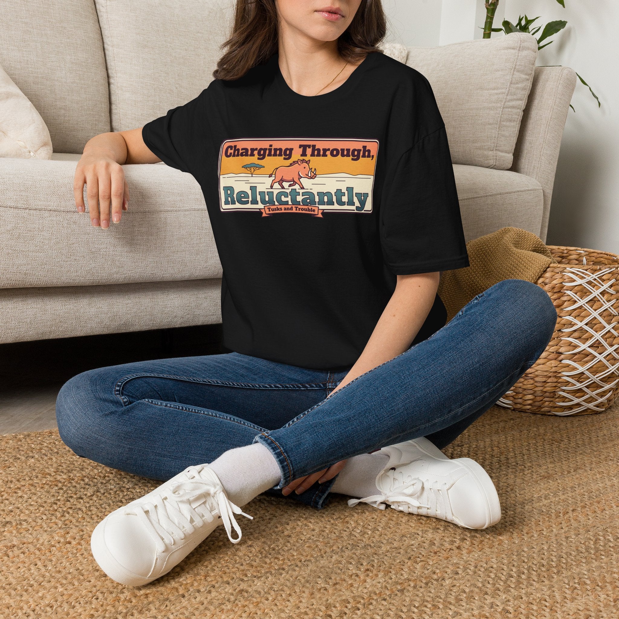 Black graphic T-shirt with cartoon rhino and retro banner-style text print