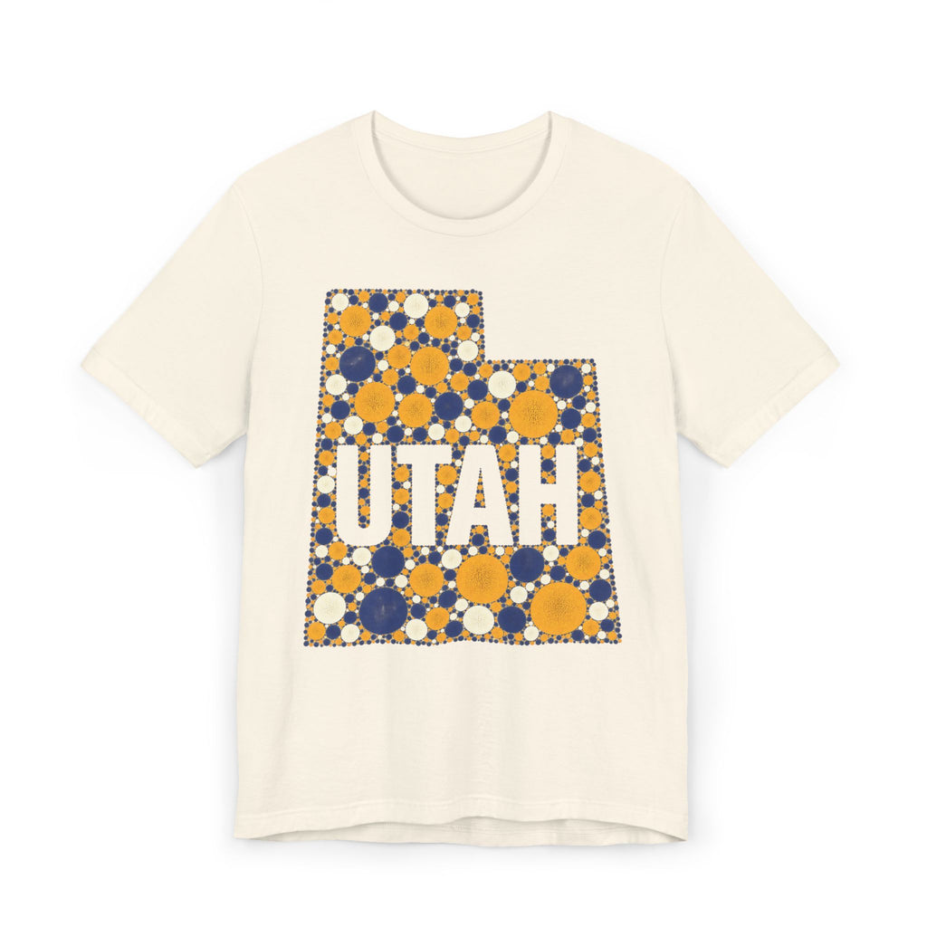 Polka dot Utah graphic t-shirt with UTAH text, blue and yellow on cream