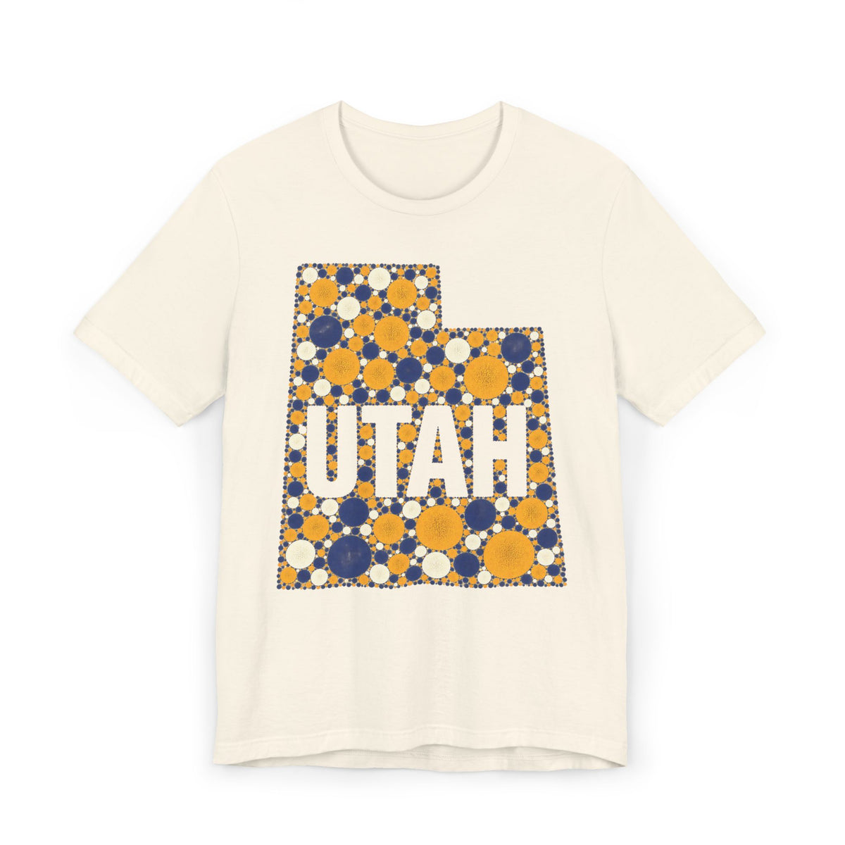 Polka dot Utah graphic t-shirt with UTAH text, blue and yellow on cream