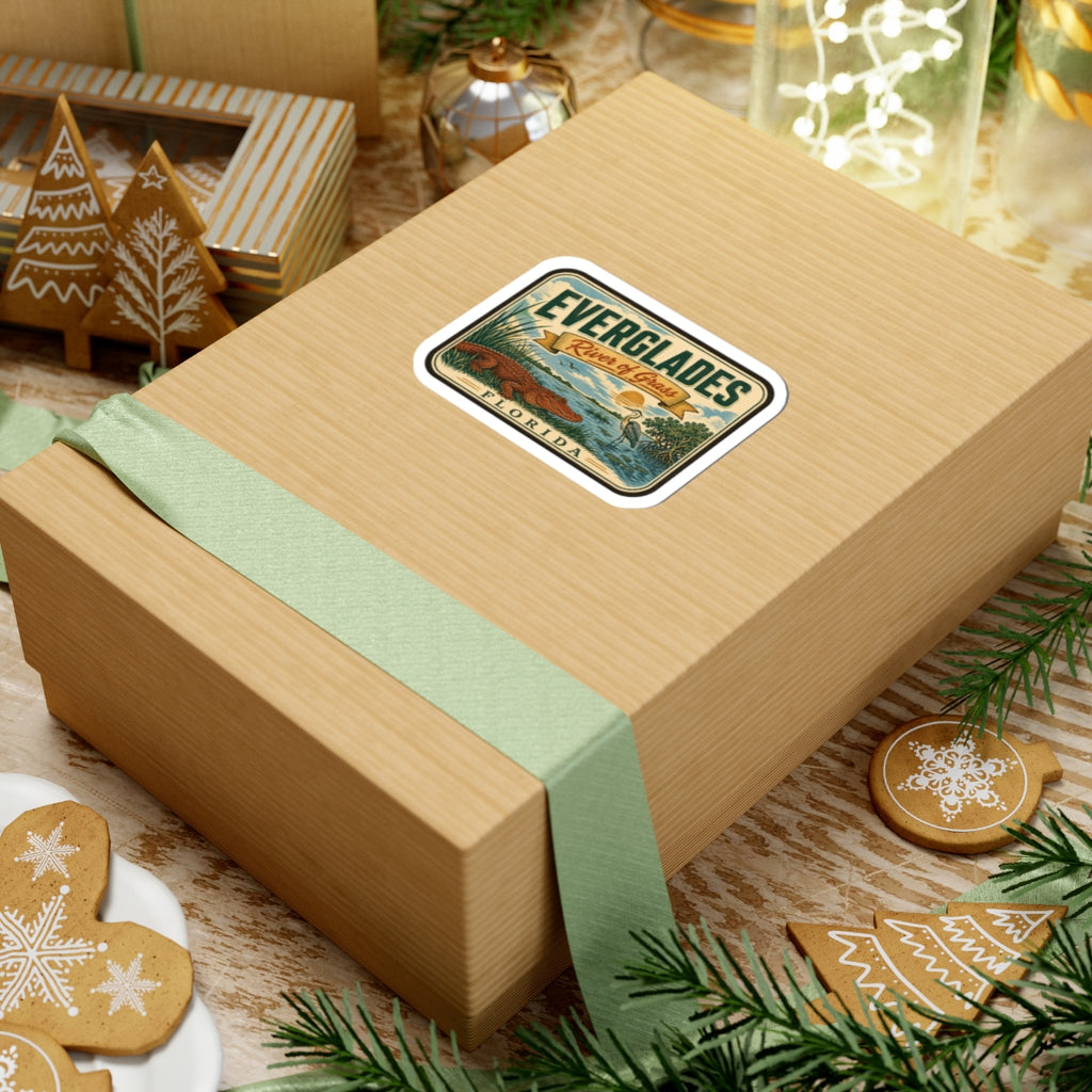 Everglades River of Grass Florida travel sticker on a wrapped gift box with ribbon.