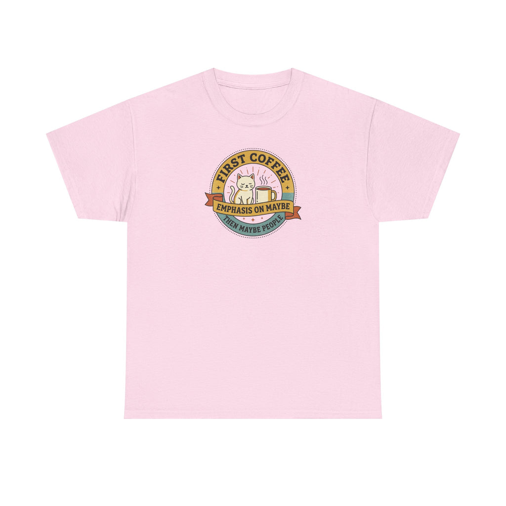 Light pink T-shirt with round “First Coffee” coffee logo graphic on chest.