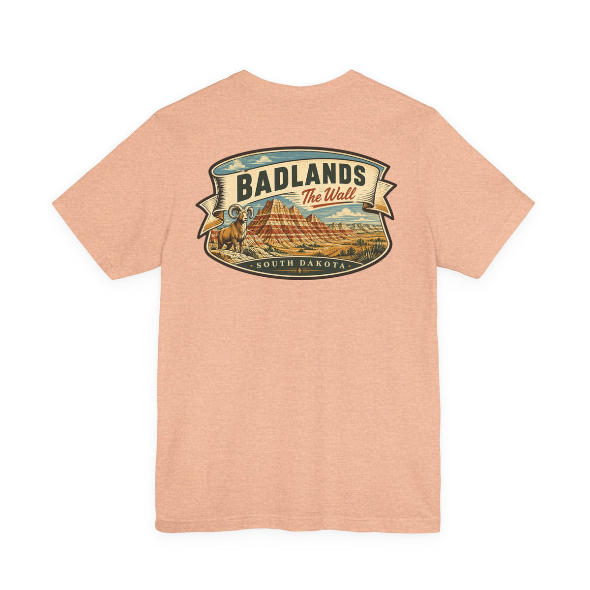 Peach graphic t-shirt with centered Badlands ribbon landscape logo