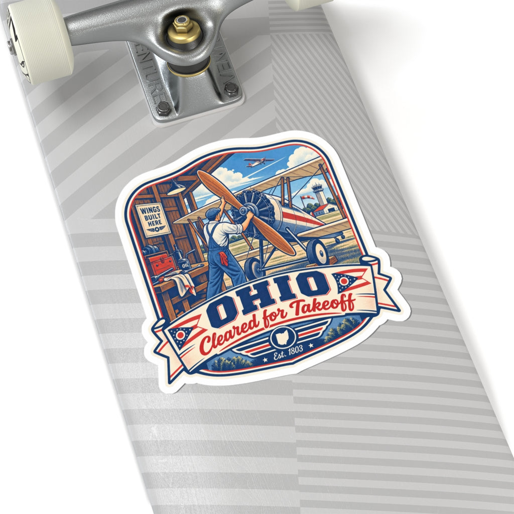 Die-cut sticker featuring pilot and biplane, "OHIO" banner, and "Cleared for Takeoff" text