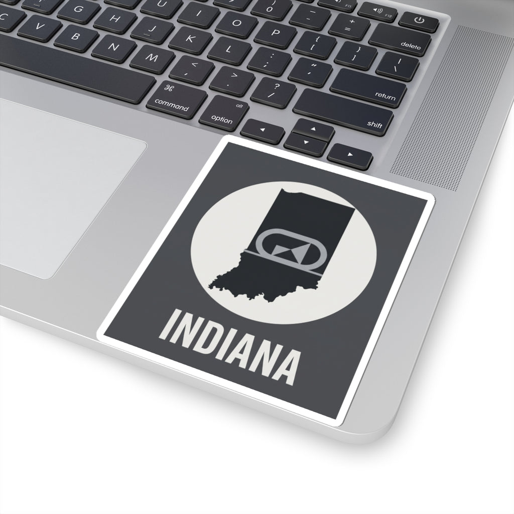 Indiana sticker on laptop trackpad area, circular badge emblem and “INDIANA” text