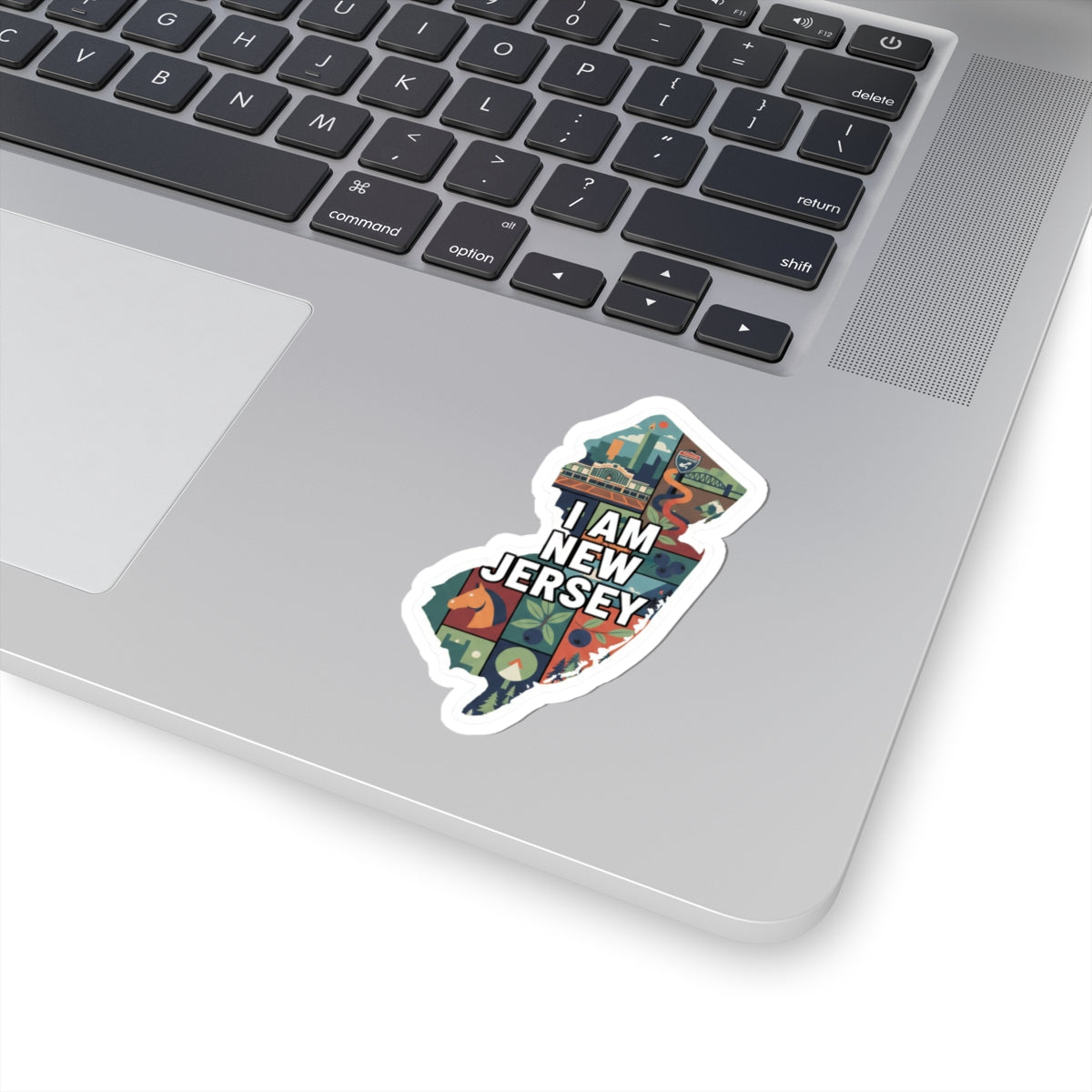 Sticker de New Jersey con borde blanco, texto “I AM NEW JERSEY” y mapa ilustrado