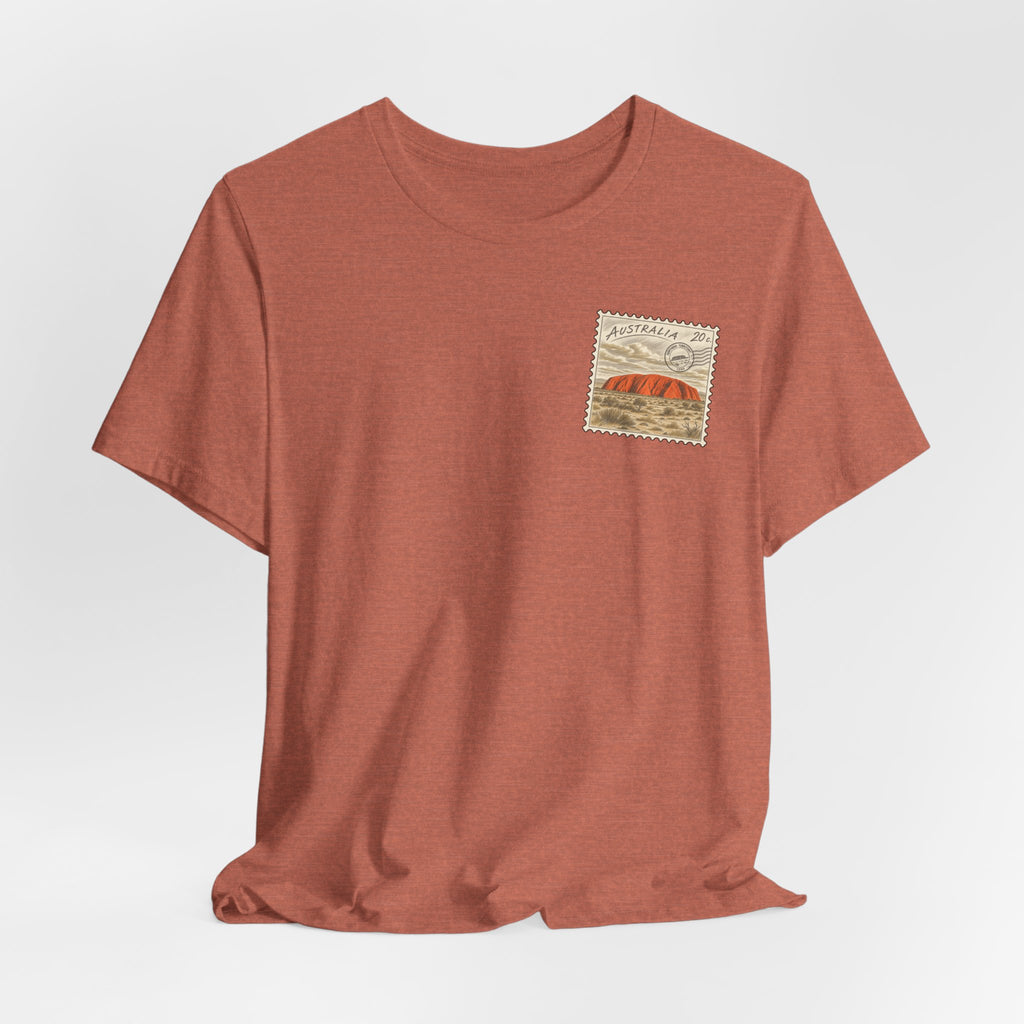 Rust red short-sleeve T-shirt with small Australia postage-stamp graphic on chest