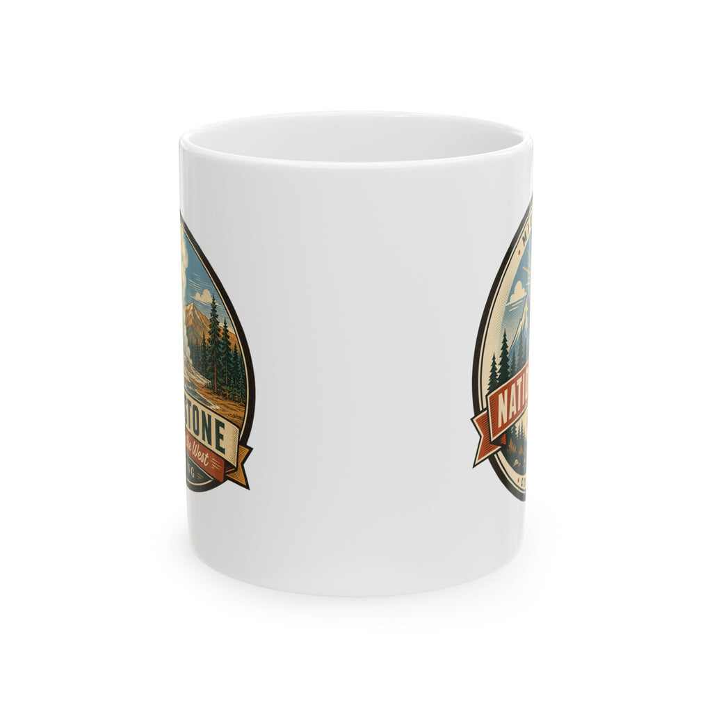 White ceramic mug with Yellowstone badge graphic on the front, no handle visible
