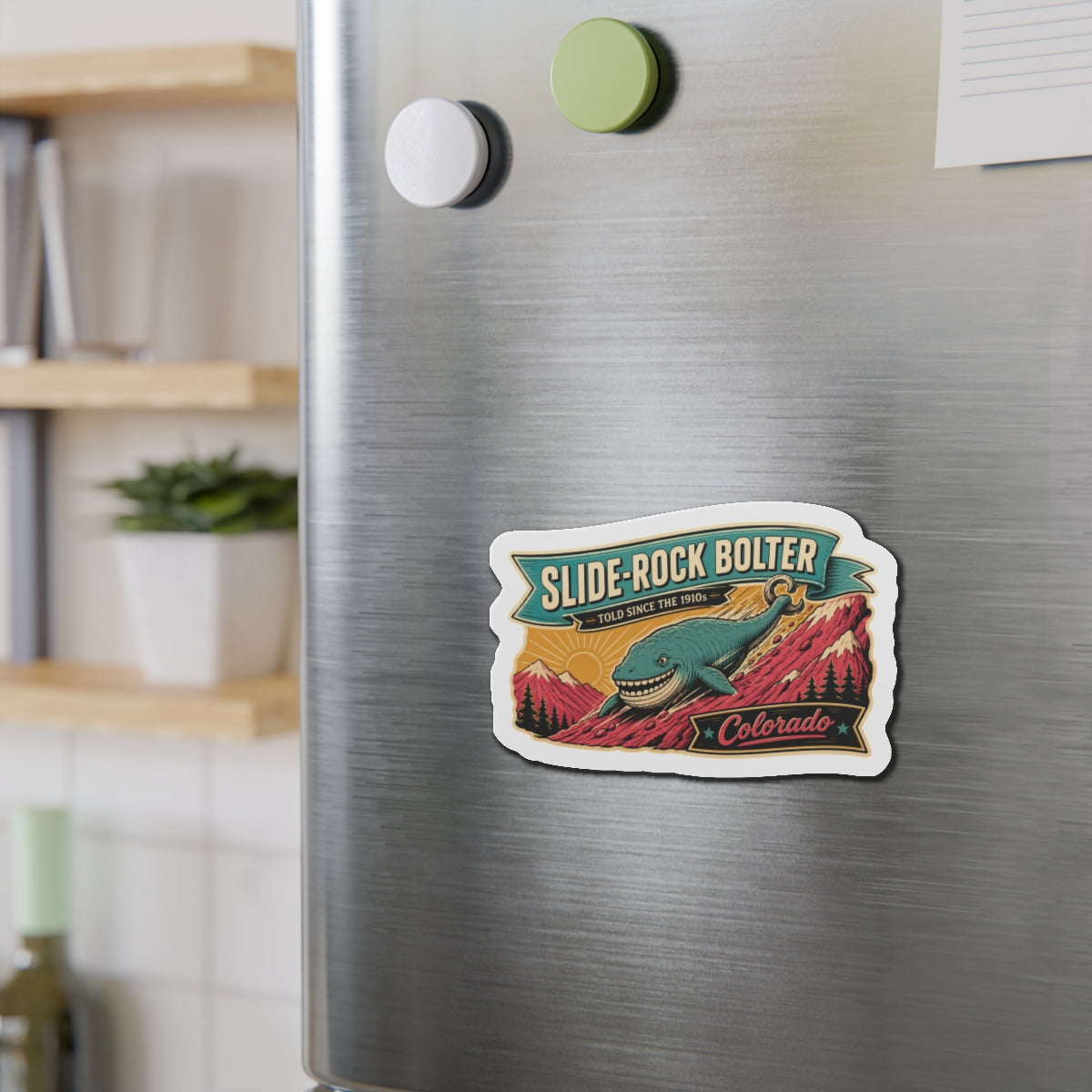 Die-cut Colorado Slide-Rock Bolter whale magnet badge on stainless refrigerator door