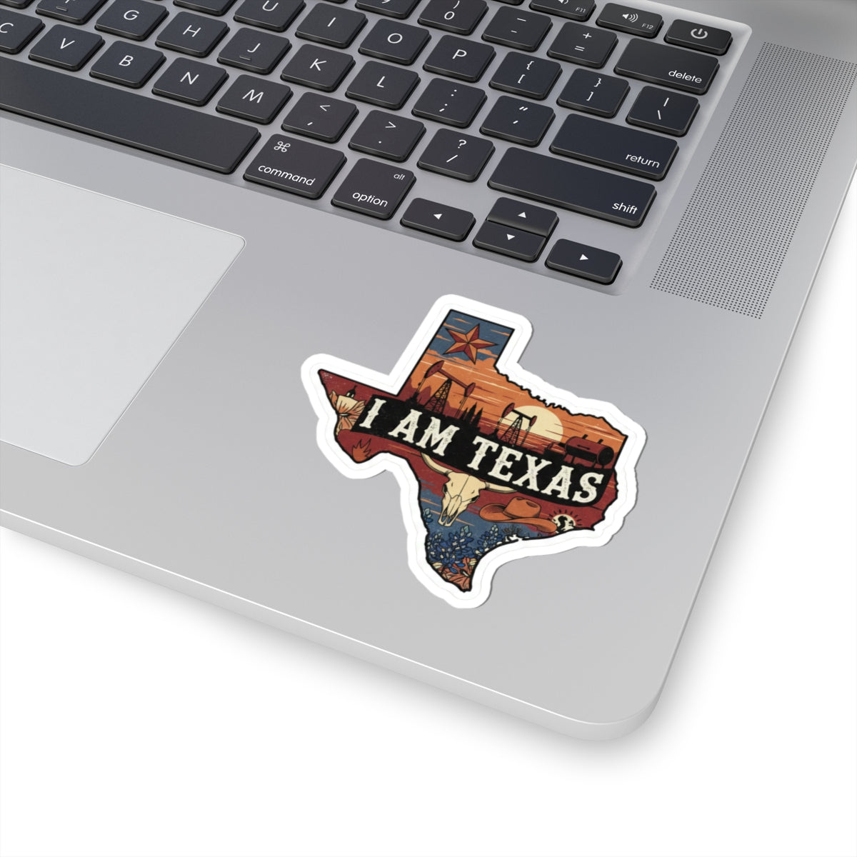 I Am Texas-Sticker mit weißem Rand auf Laptop, „I AM TEXAS“ Texas-Design