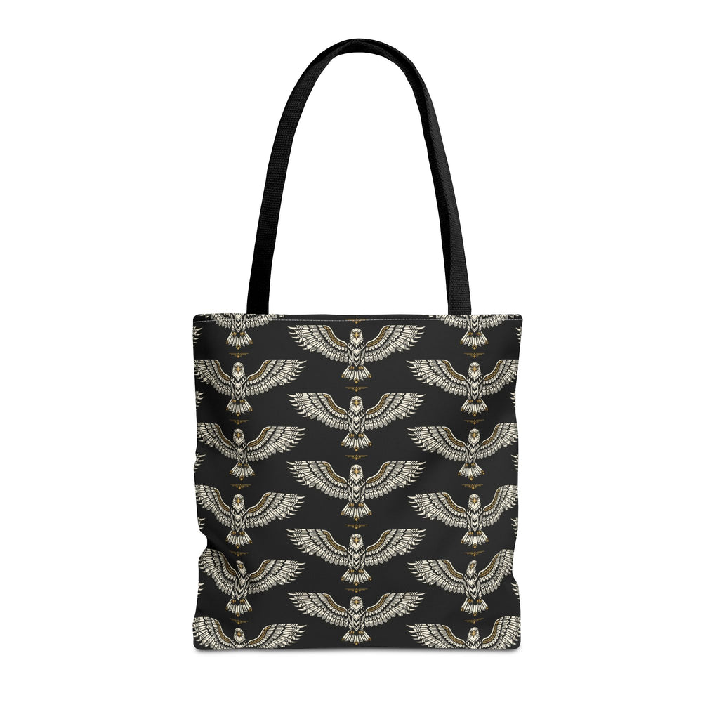Tote bag with black fabric and repeating gold winged scarab pattern, black handles