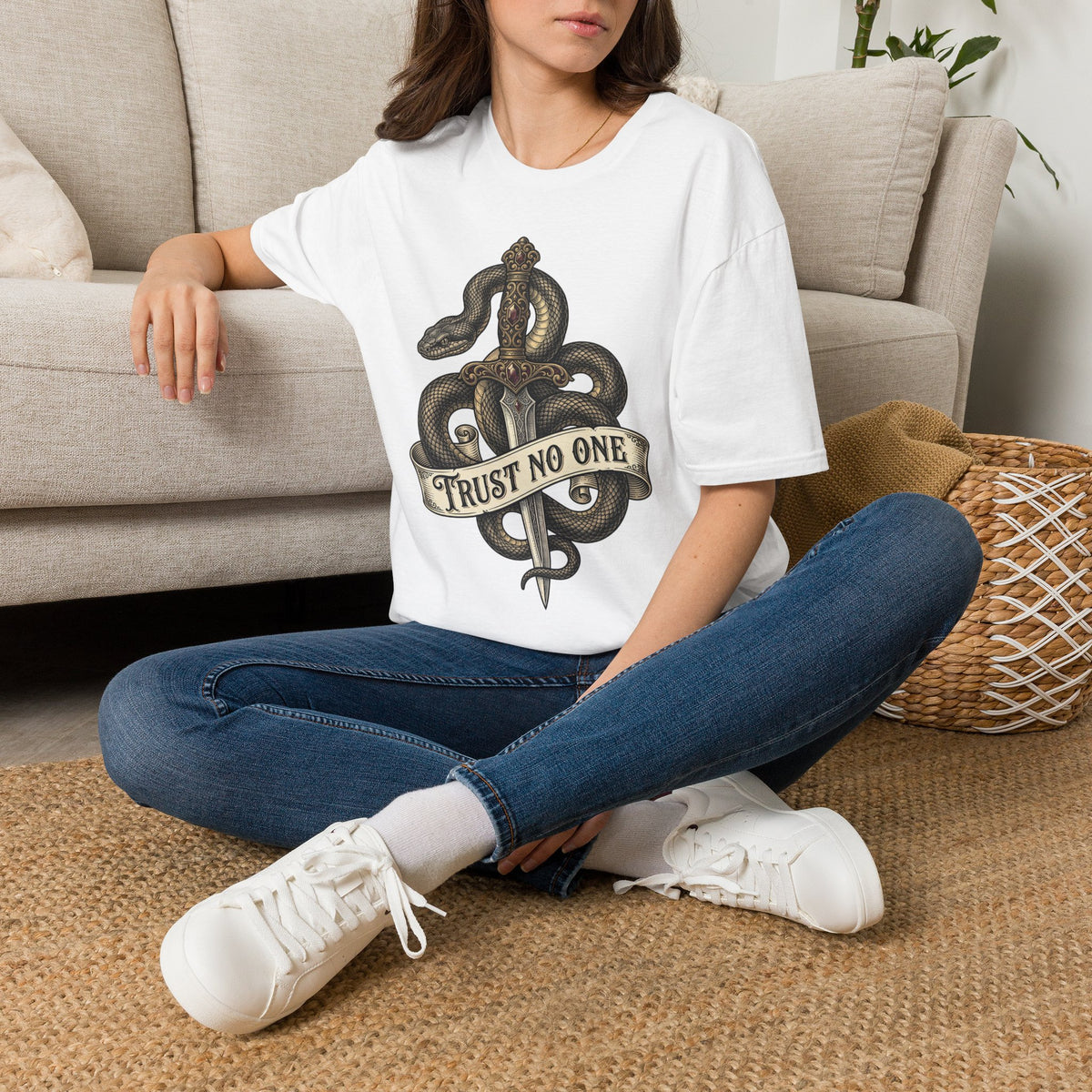 White graphic T-shirt with snake and dagger design, crew neck and short sleeves