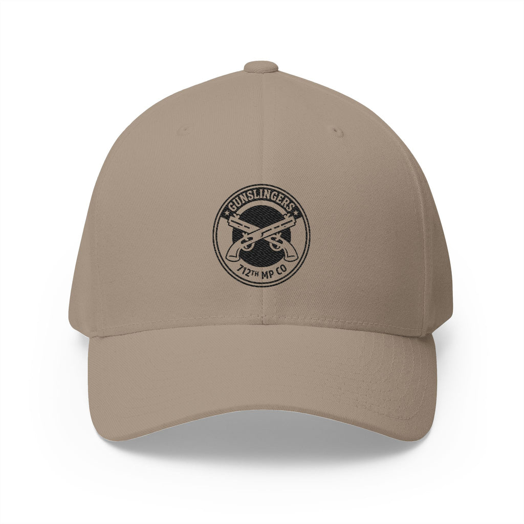 Khaki embroidered baseball cap with black circular emblem on front