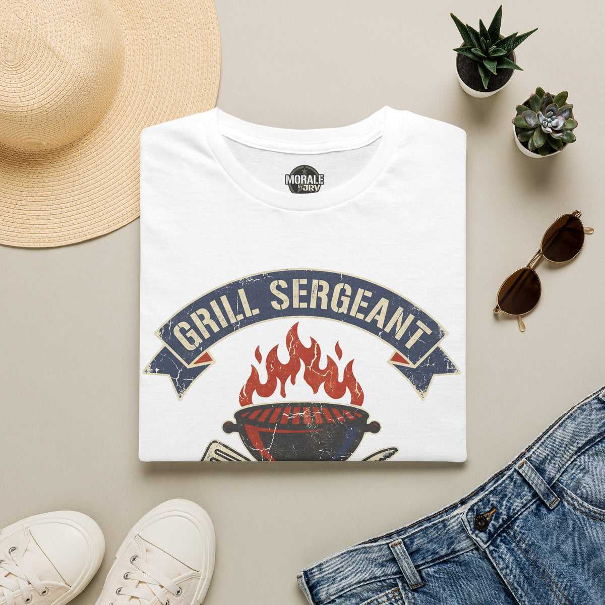 White crewneck t-shirt with flaming grill and crossed utensils graphic emblem
