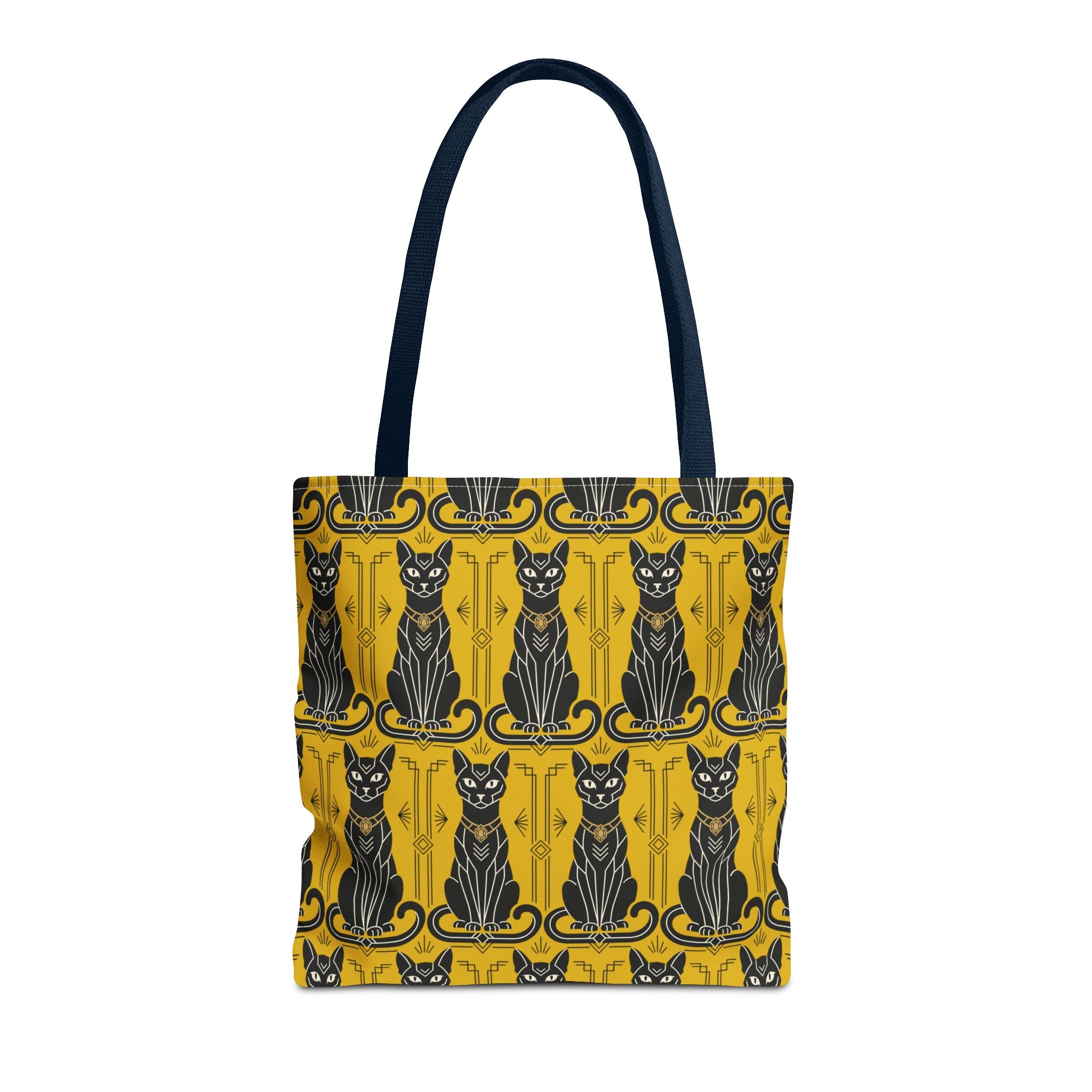 Yellow tote bag with black cat pattern and decorative border; dark navy handles