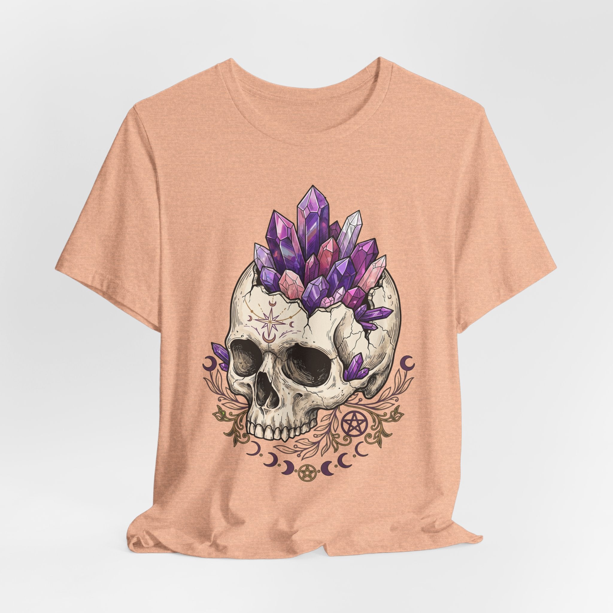 Amethyst crystal skull T-shirt in heather peach, full purple skull with decorative accents