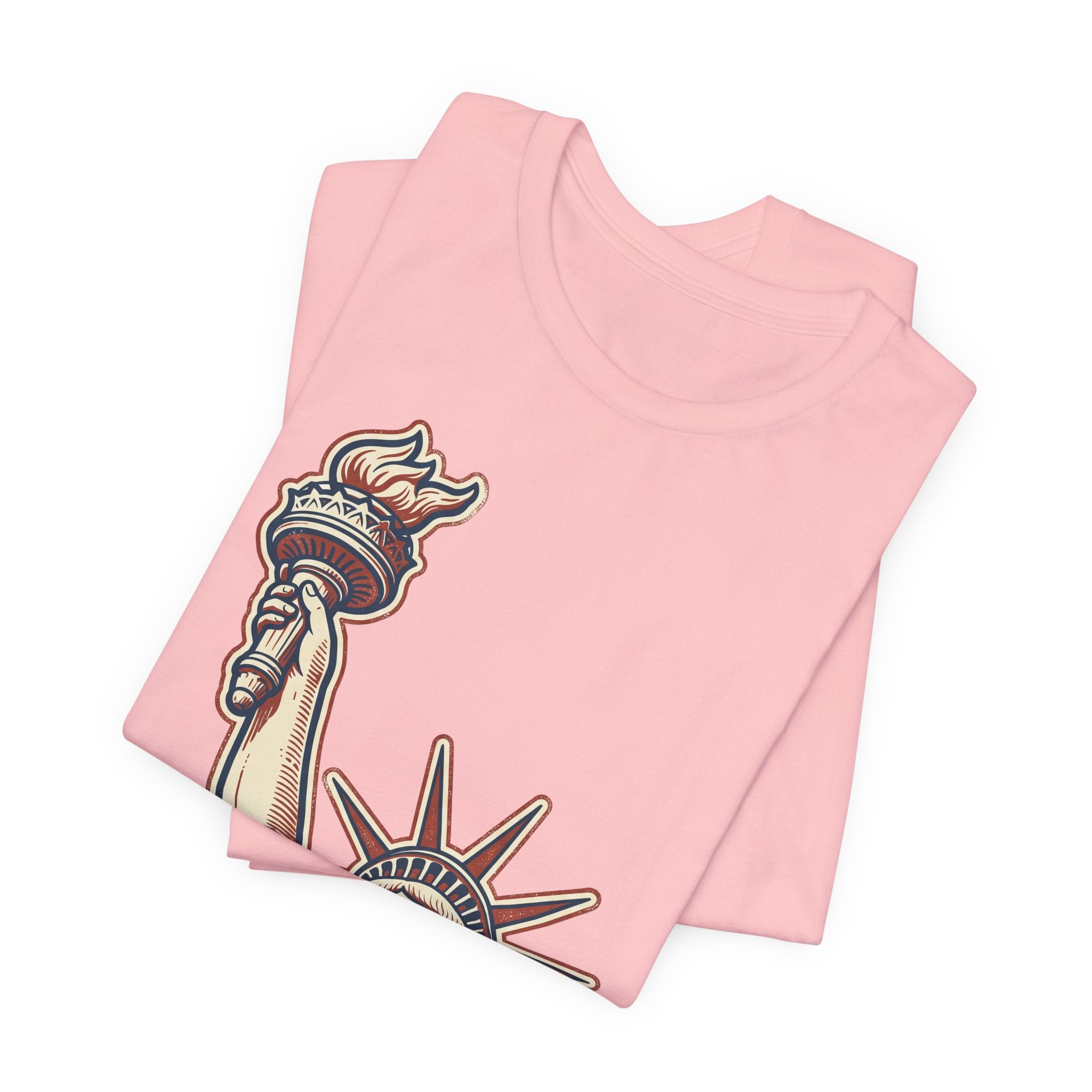 Light pink graphic tee stack with Liberty Statue illustration on front
