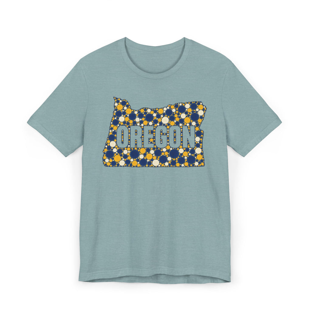 Light blue Oregon map graphic t-shirt with blue and gold polka dot lettering