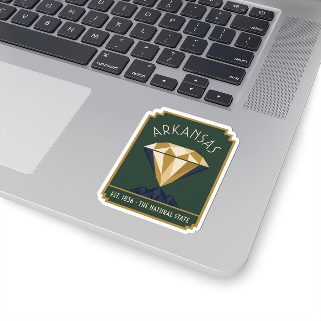 Arkansas diamond sticker placed on a laptop trackpad area