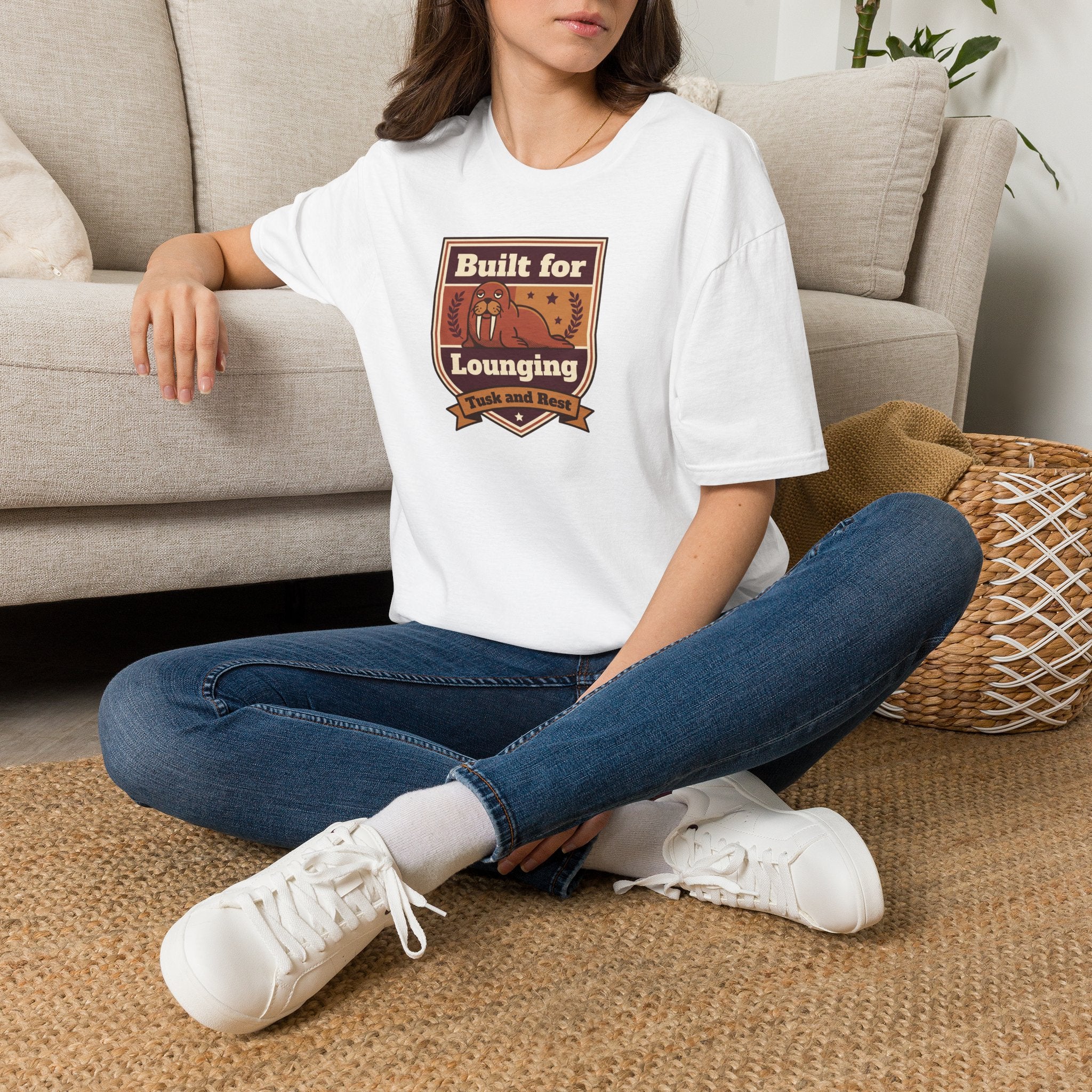 White short-sleeve t-shirt with walrus “Built for Lounging” graphic on chest