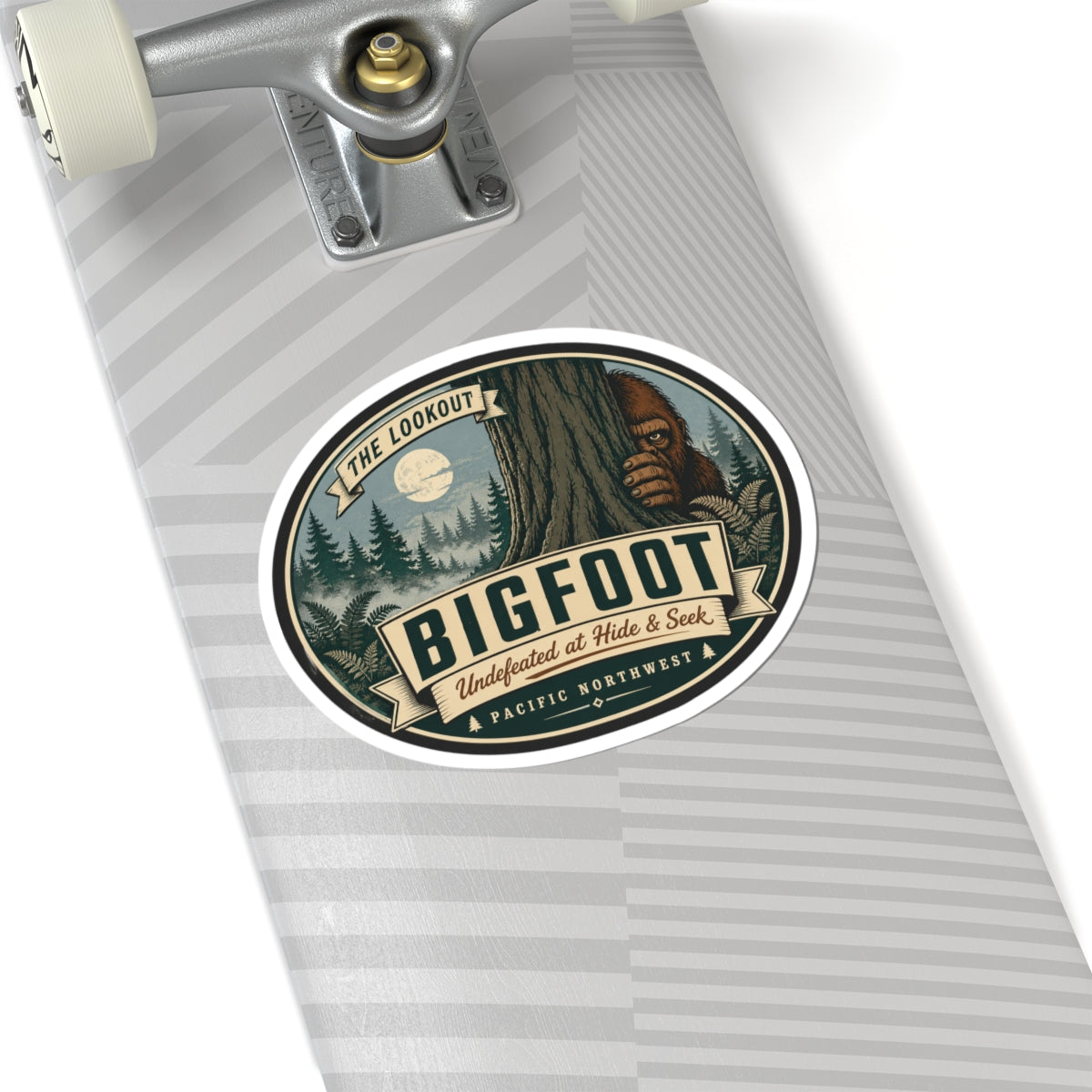 Round kiss-cut Bigfoot outdoor logo vinyl sticker on gray striped label backing