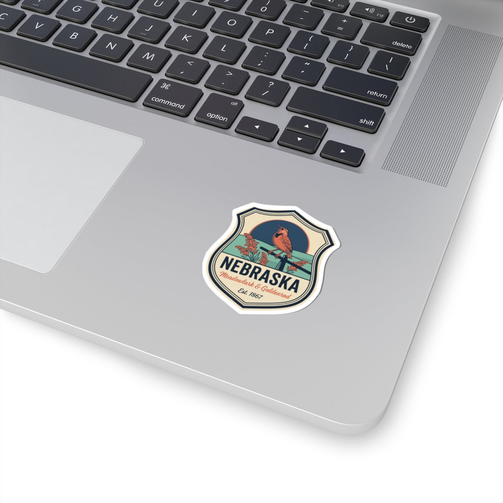 Vintage Nebraska state badge vinyl sticker with blue bird and NEBRASKA text