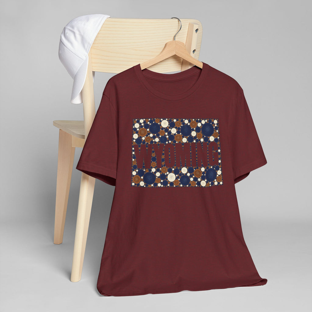 Burgundy crew-neck t-shirt with polka-dot Wyoming map graphic on chest