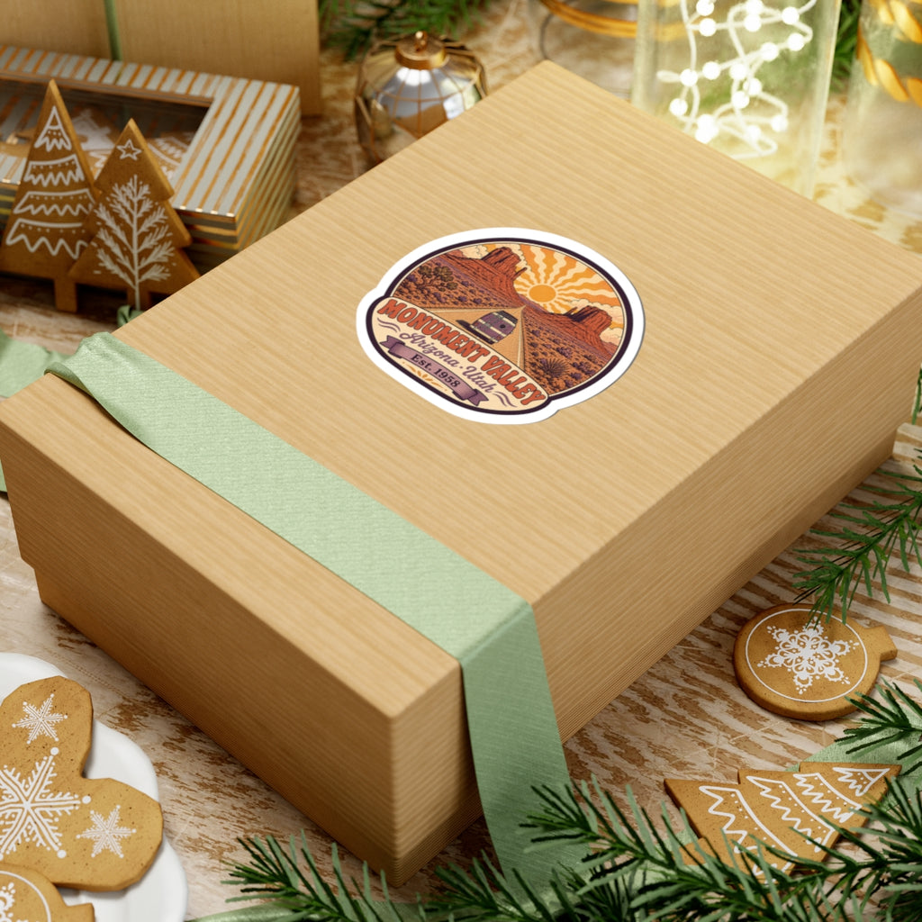 Round desert van sticker on gift box lid with Monument Valley text