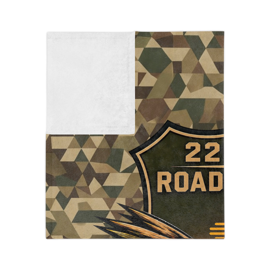 Camo microfiber blanket corner with partial “ROAD” shield patch and golden emblem