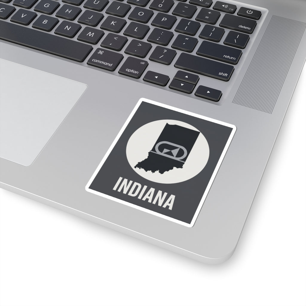 Indiana sticker on laptop, black-and-white badge emblem with “INDIANA” text