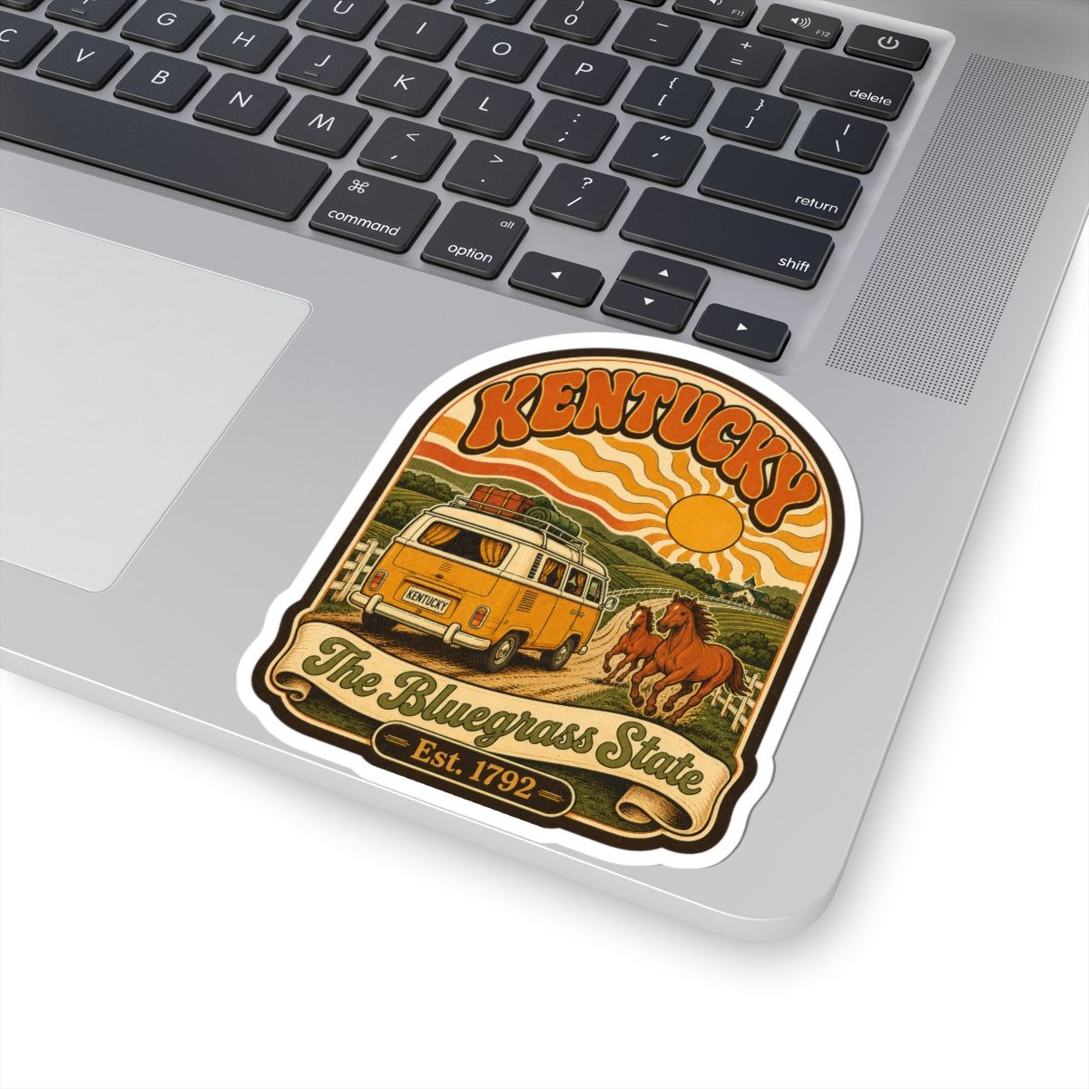 Kentucky retro van and horse sticker centered on a laptop