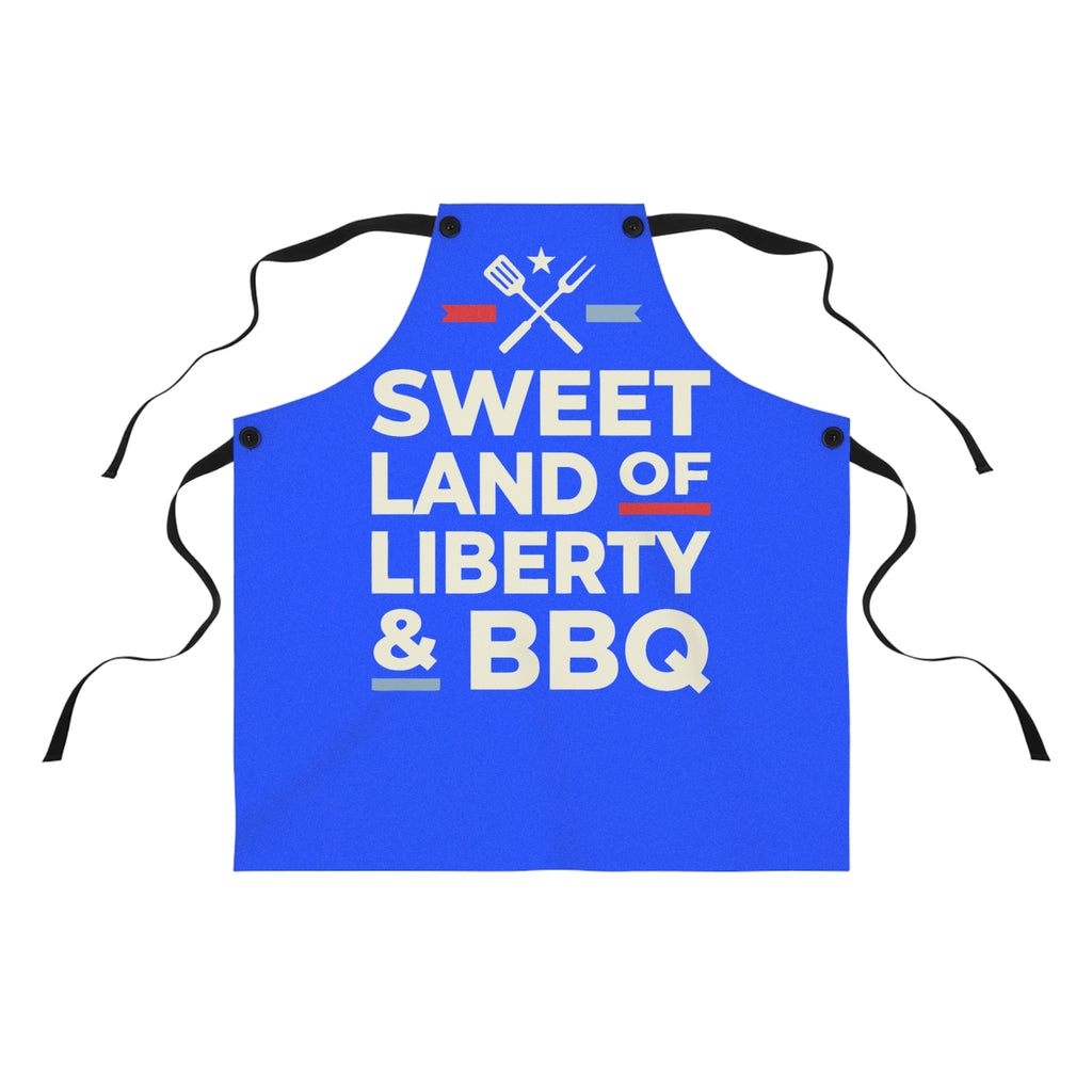 Blue BBQ apron with 'Sweet Land of Liberty & BBQ' graphic and cooking utensils