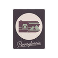Mauve metal Pennsylvania wall art with oval landscape silhouette and script “Pennsylvania”