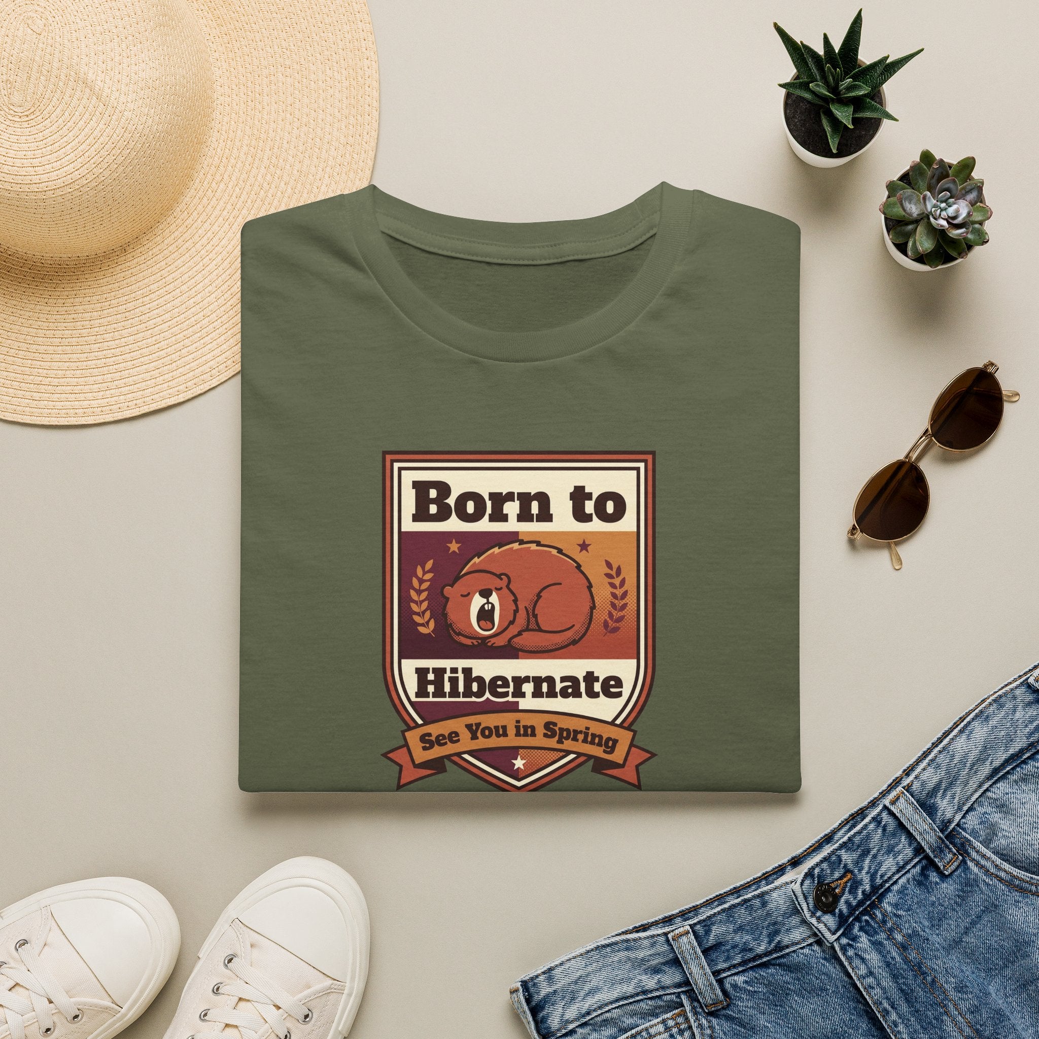 Military green graphic T-shirt with centered bear "Born to Hibernate" badge print