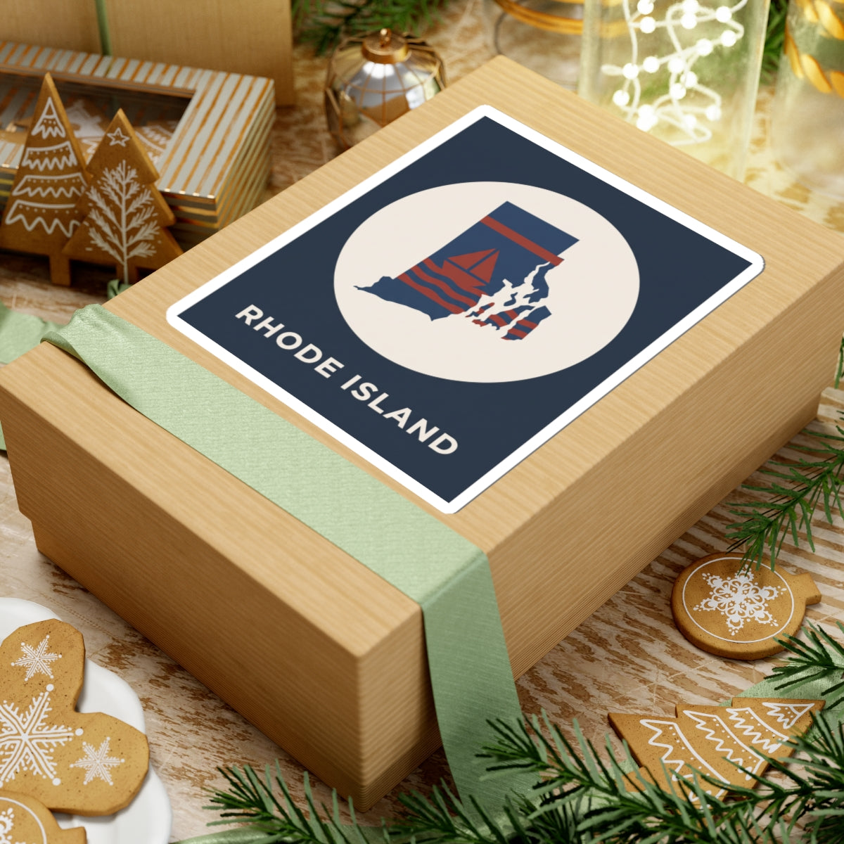 Rhode Island sticker on wrapped gift, dark blue square with white circle and sailboat map