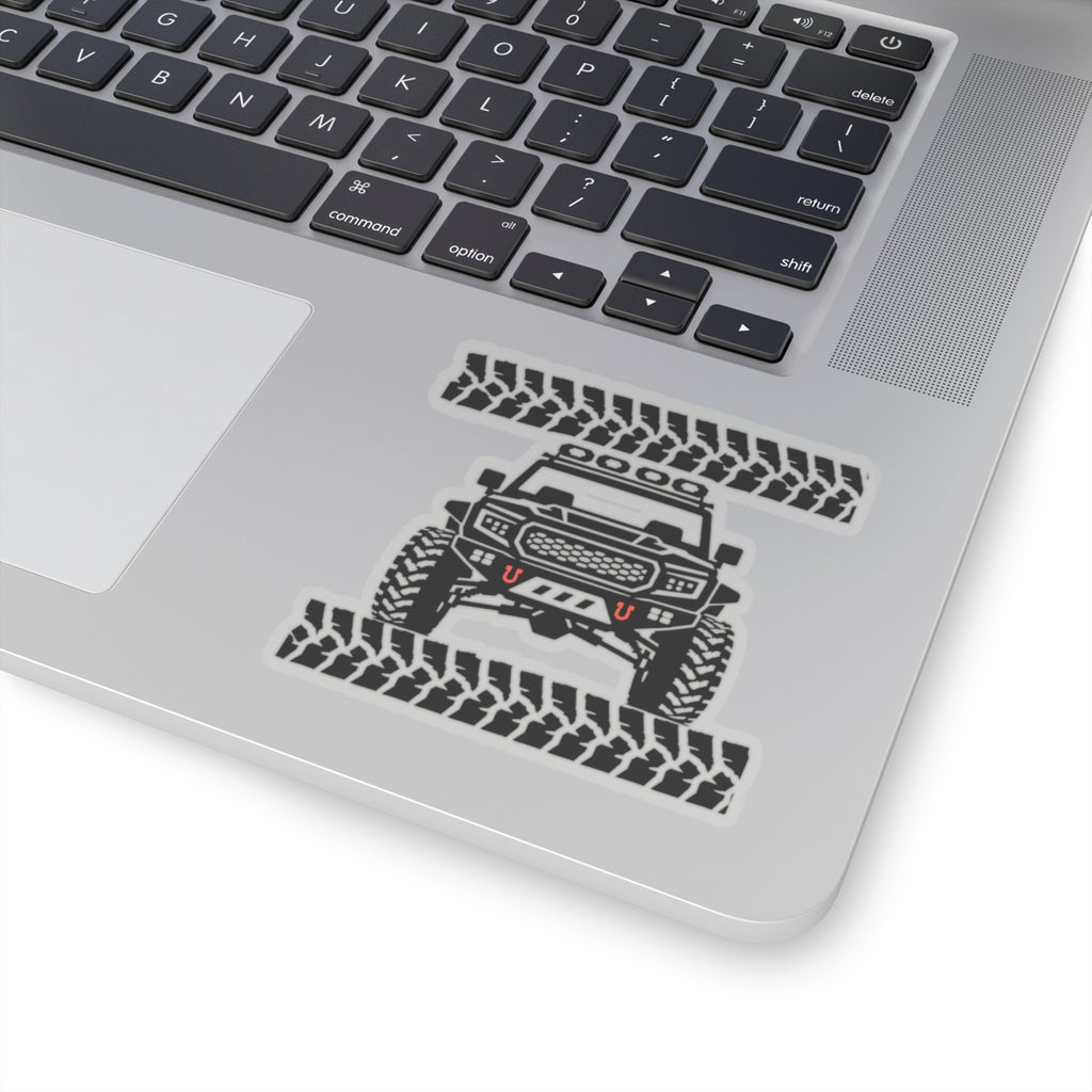 Off-road truck decal sticker on laptop, front truck graphic with tire tread background
