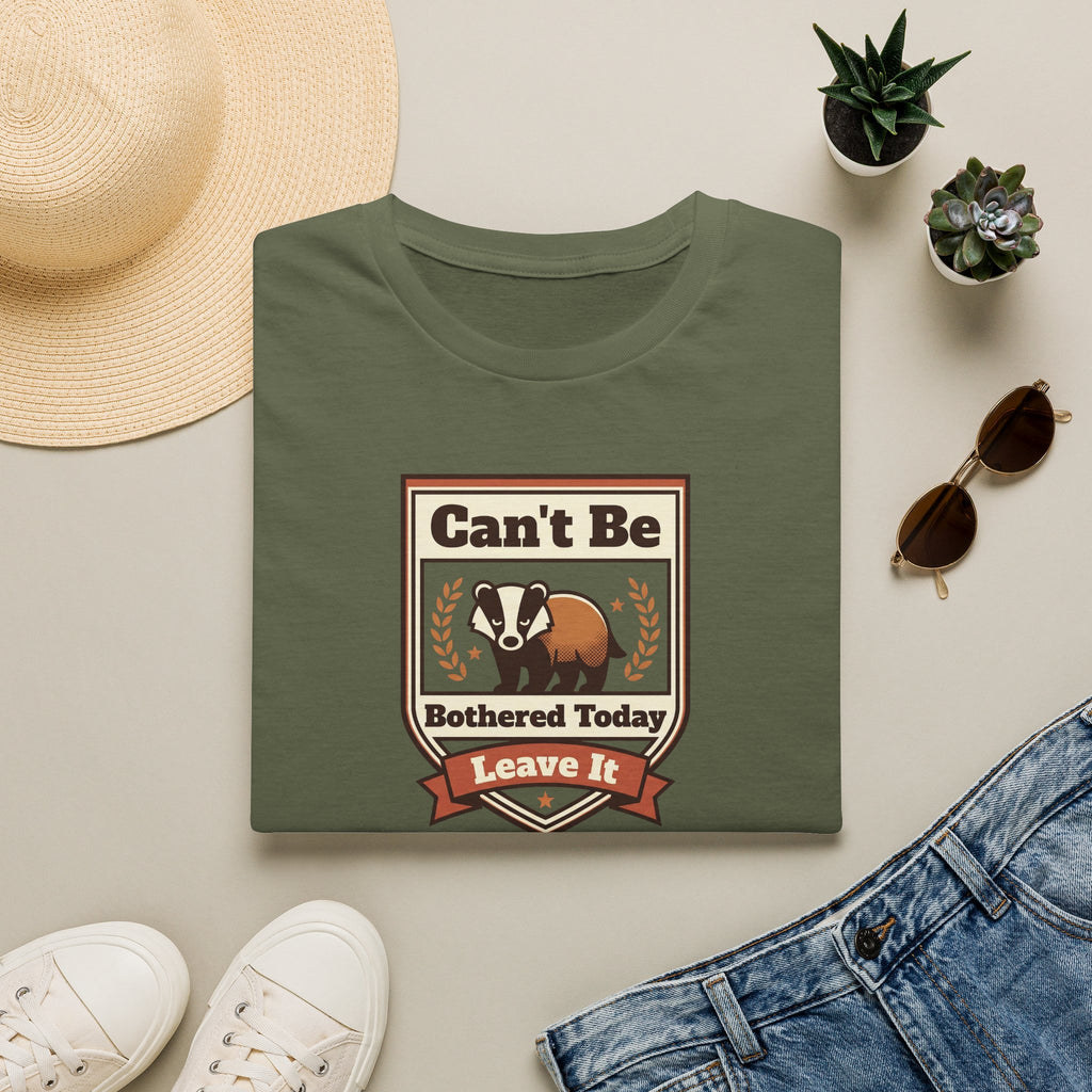 Olive green T-shirt with crew neck and brown skunk graphic with laurel and ribbon.