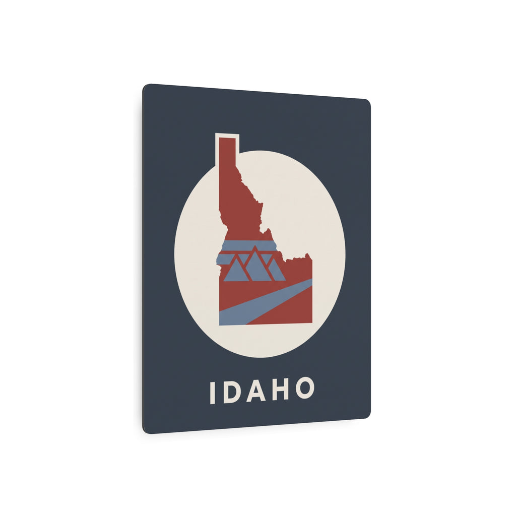 Idaho map graphic metal sign, dark blue face with white circle, red state, and IDAHO text