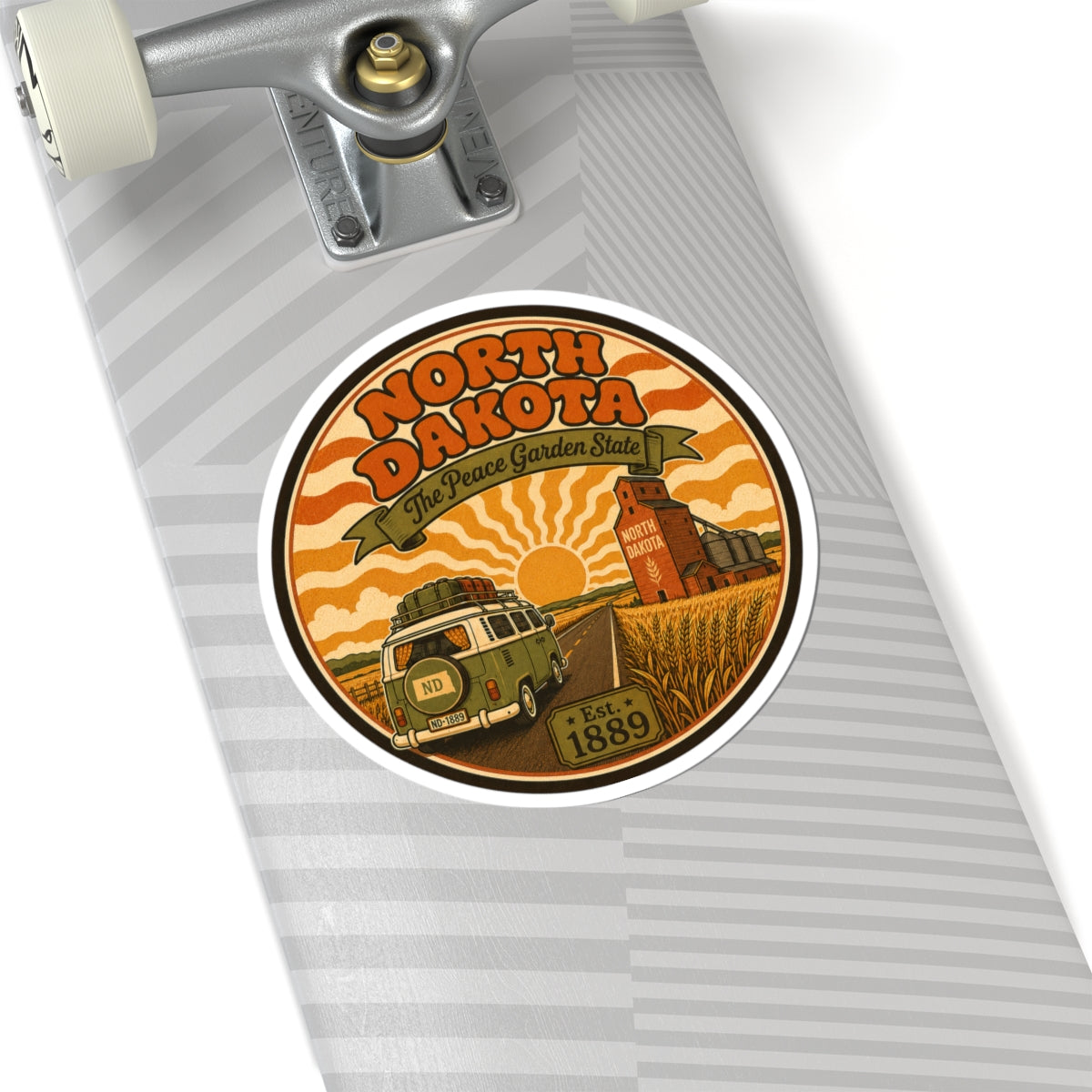 Round kiss-cut North Dakota sticker with retro truck, granary buildings and Est. 1889