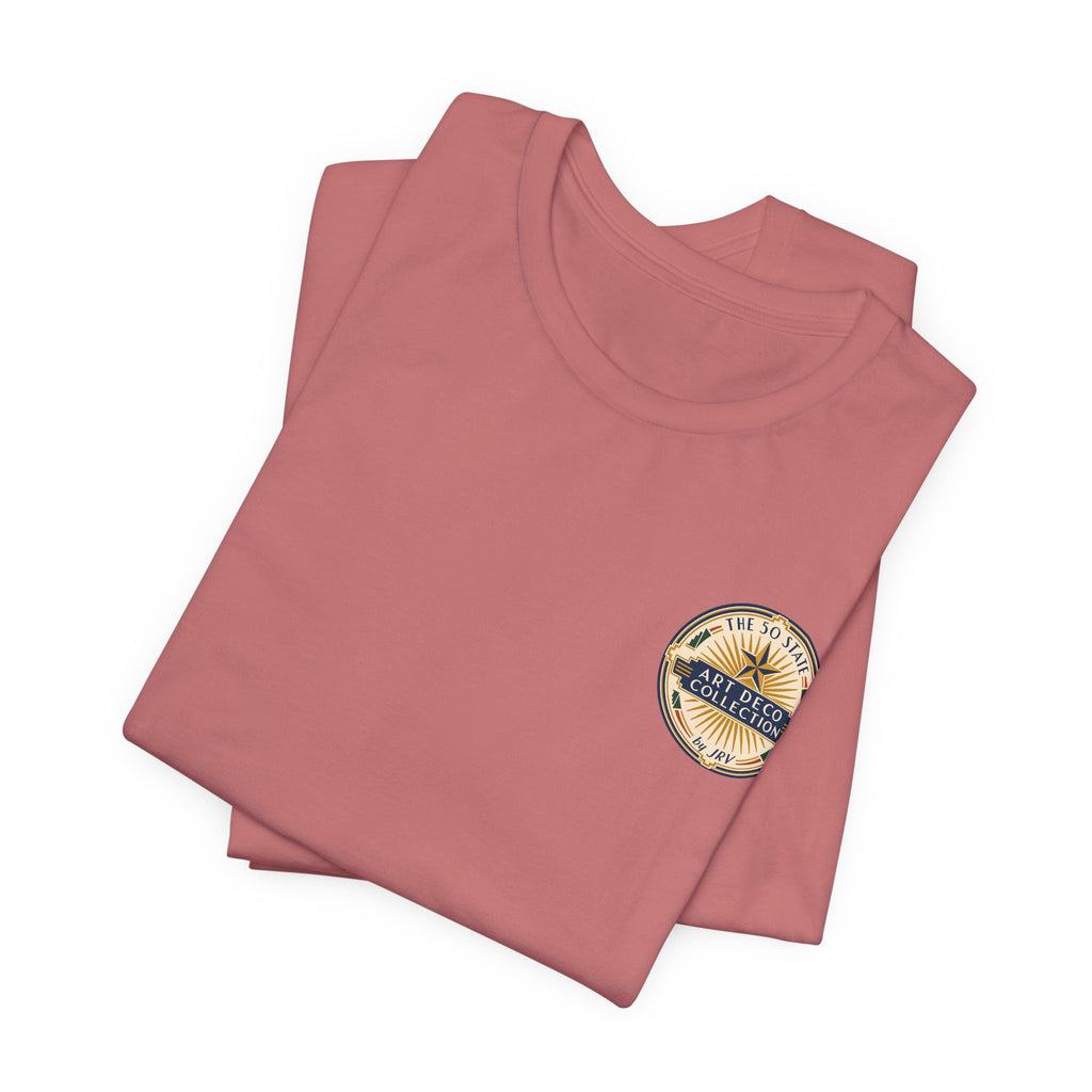 Dusty rose T-shirt with small circular logo on the upper right chest, folded view.