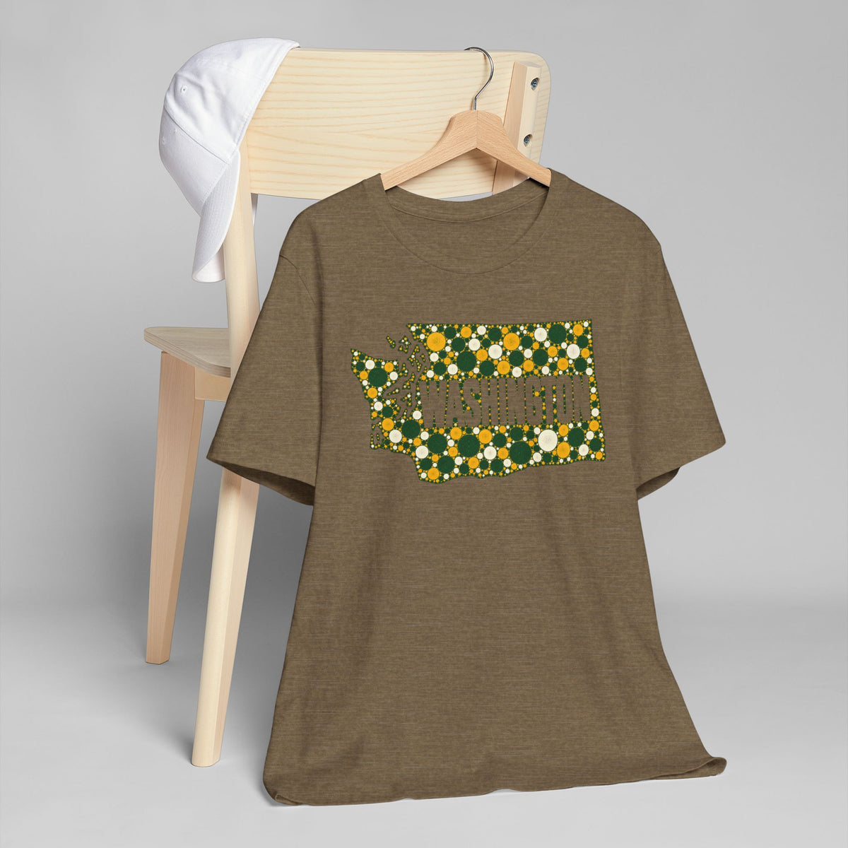 Olive T-shirt with rectangular floral map graphic in gold and green dots