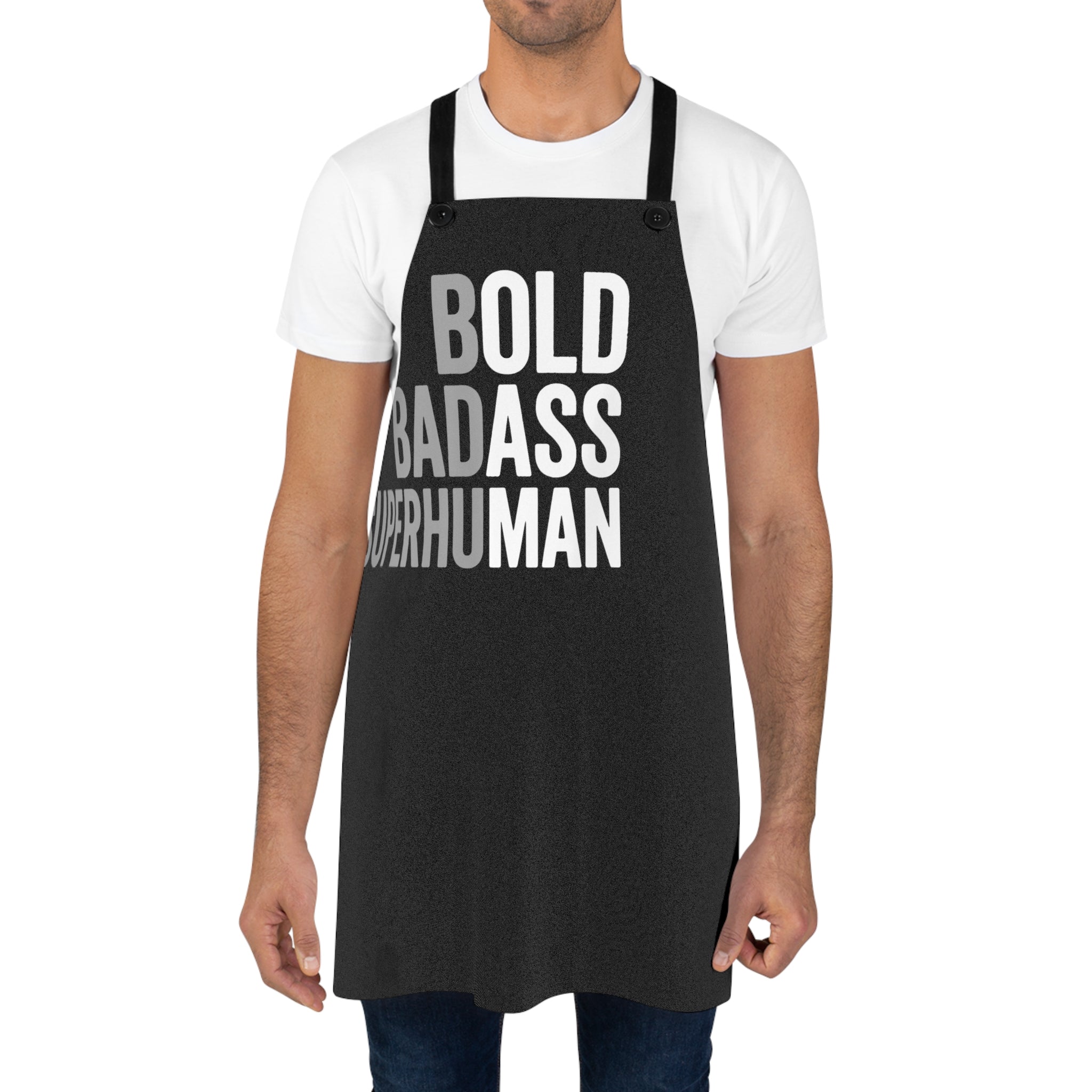 Black apron over white T-shirt with bold 'BOLD BADASS SUPERHUMAN' front lettering