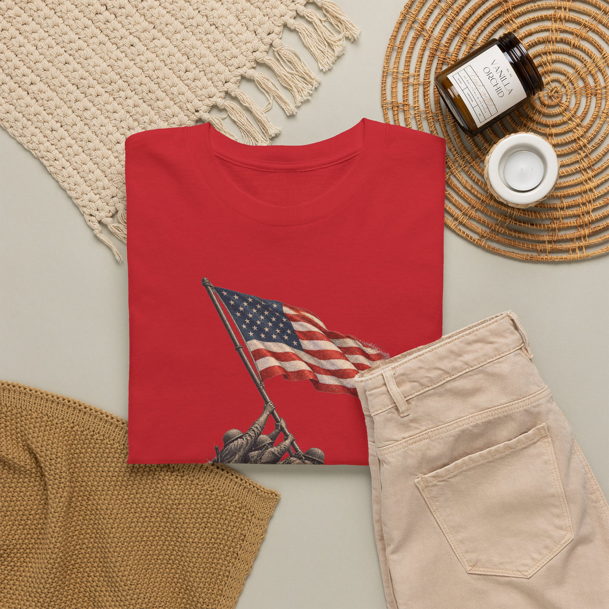 Red crew-neck T-shirt featuring a flag-raising graphic