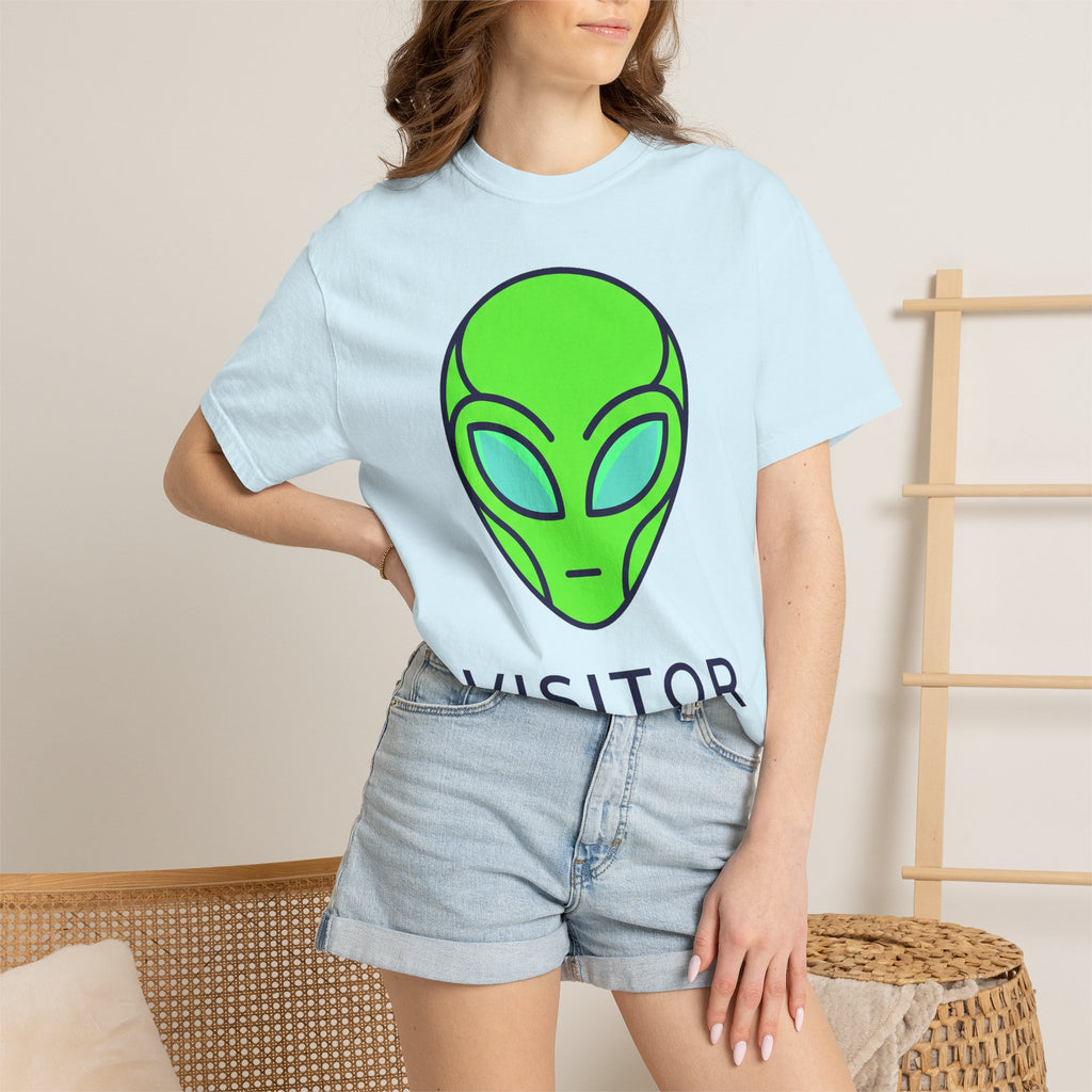 Light blue alien visitor T-shirt with neon green alien face graphic, crew neck