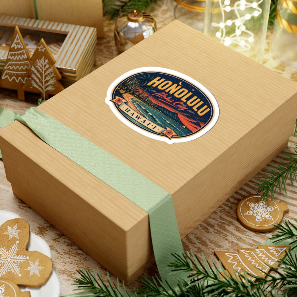 Honolulu luggage tag sticker on gift box, oval beach sunset artwork with 'Aloha City'